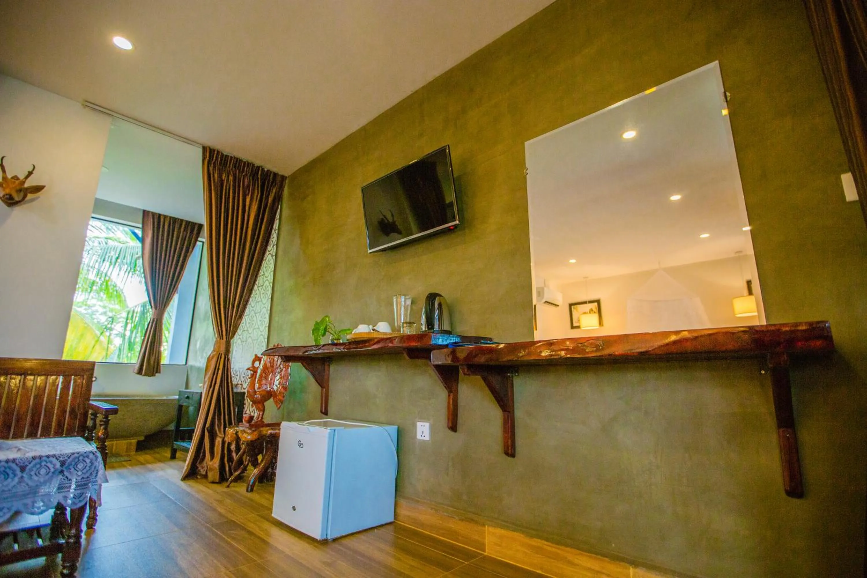 Communal lounge/ TV room in Moloppor Villa