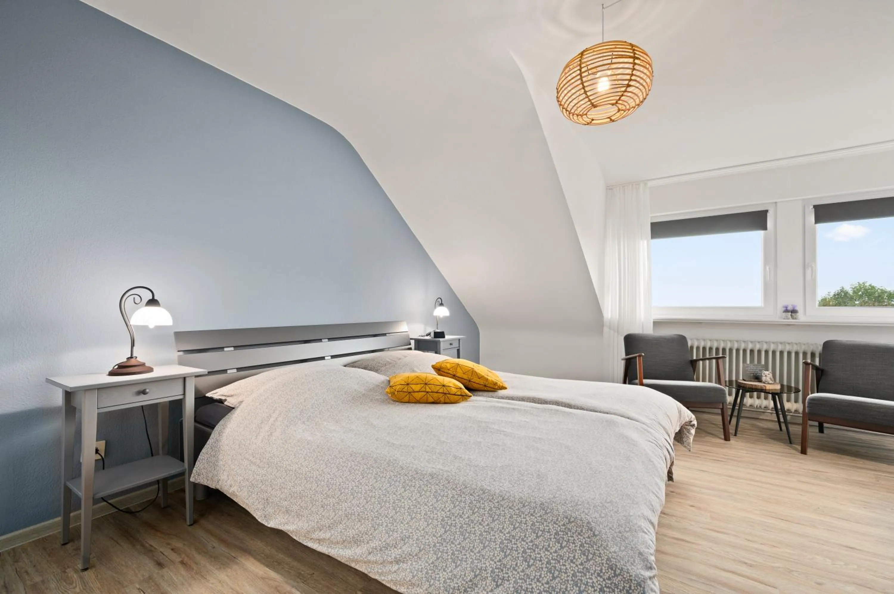 Seating area, Bed in Gästehaus Hoxel