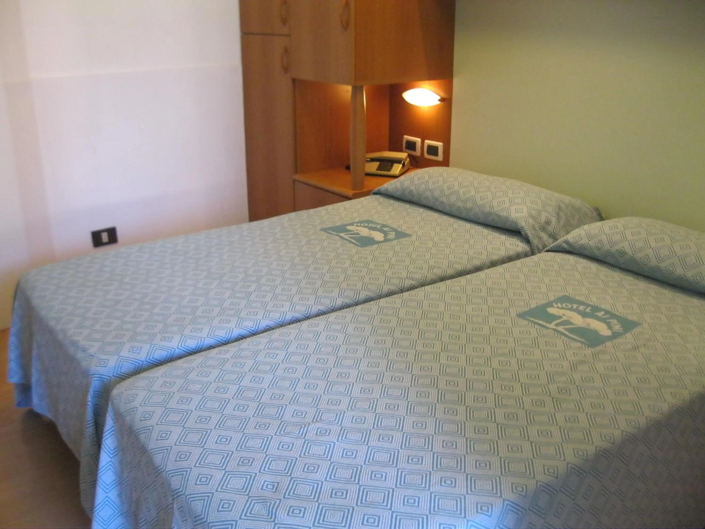 Bed in Hotel Ai Pini