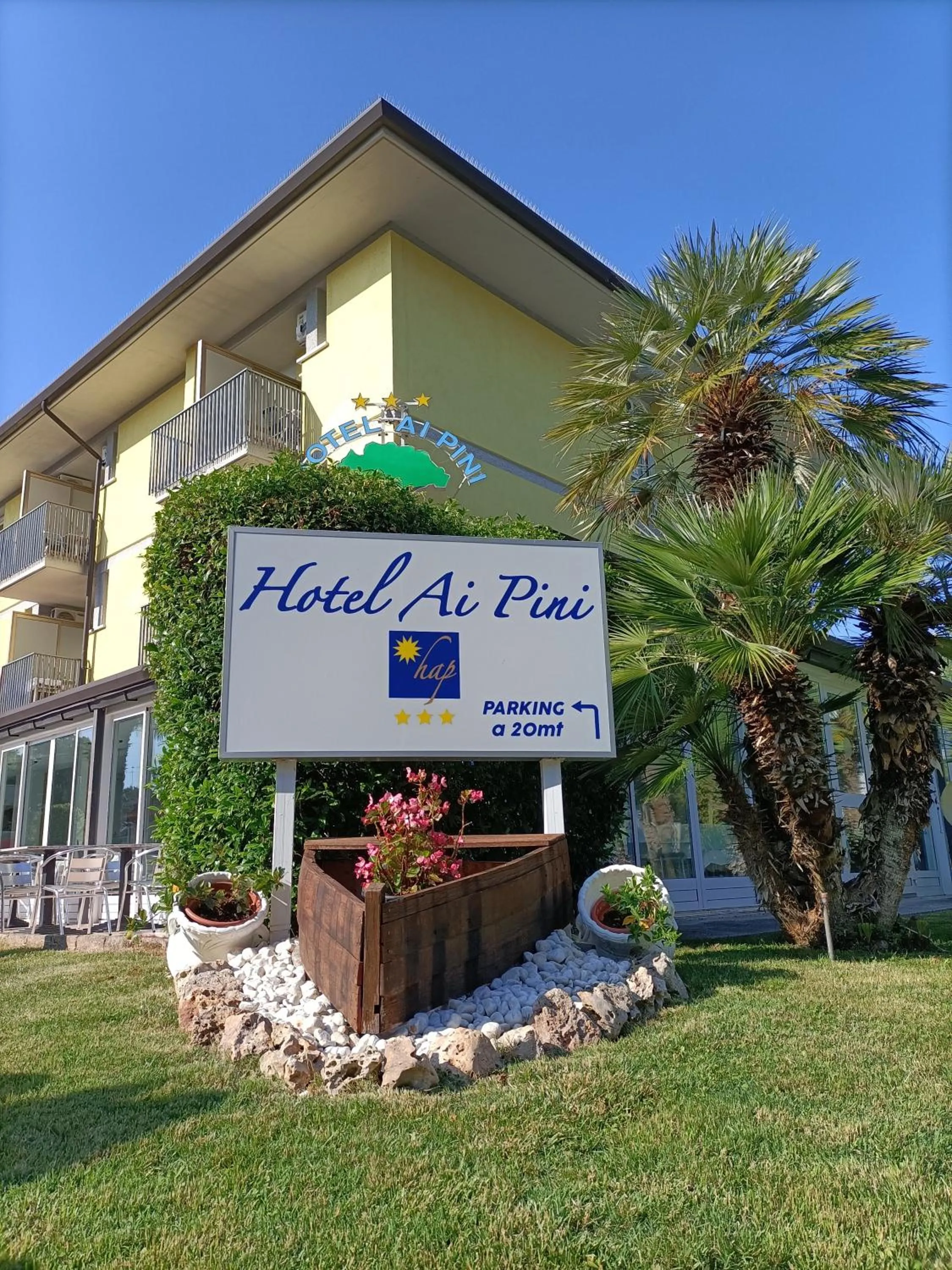 Property logo or sign in Hotel Ai Pini