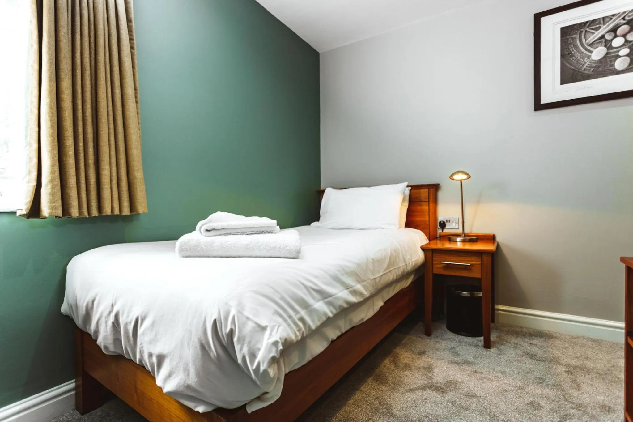 Bed in The Dog & Doublet Inn