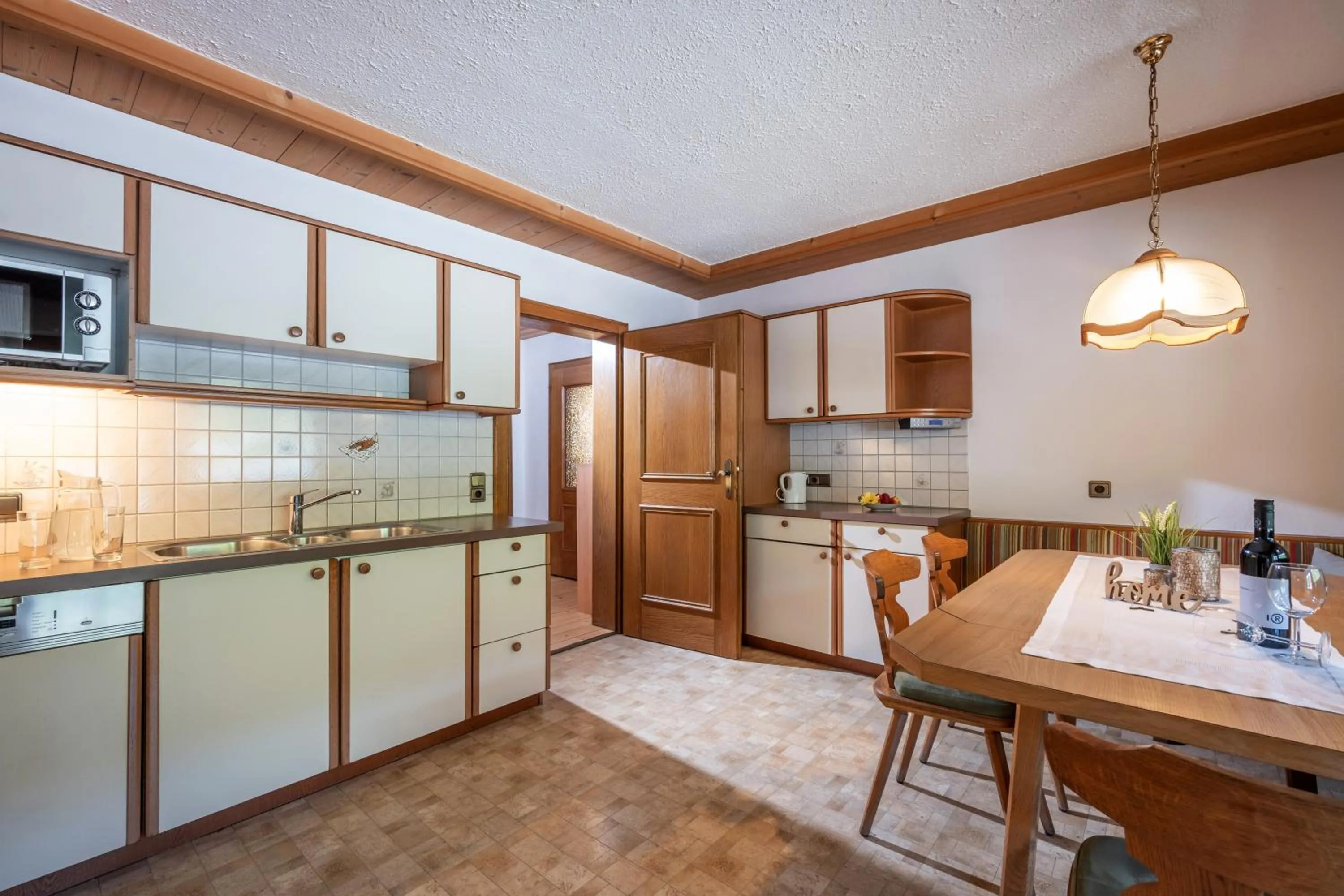 Kitchen or kitchenette in Ferienwohnung Hauser