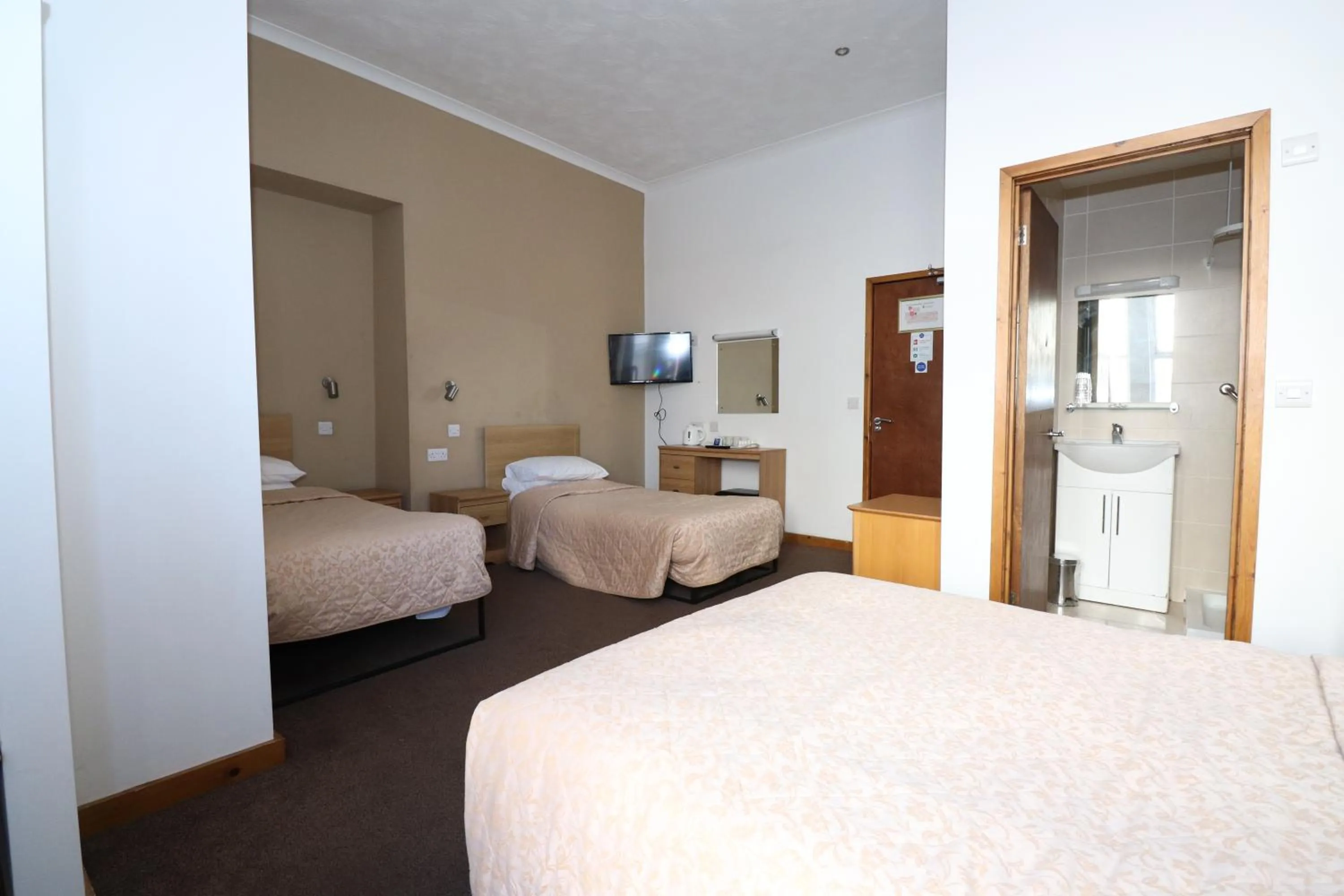 Bed in The Sandringham Hotel