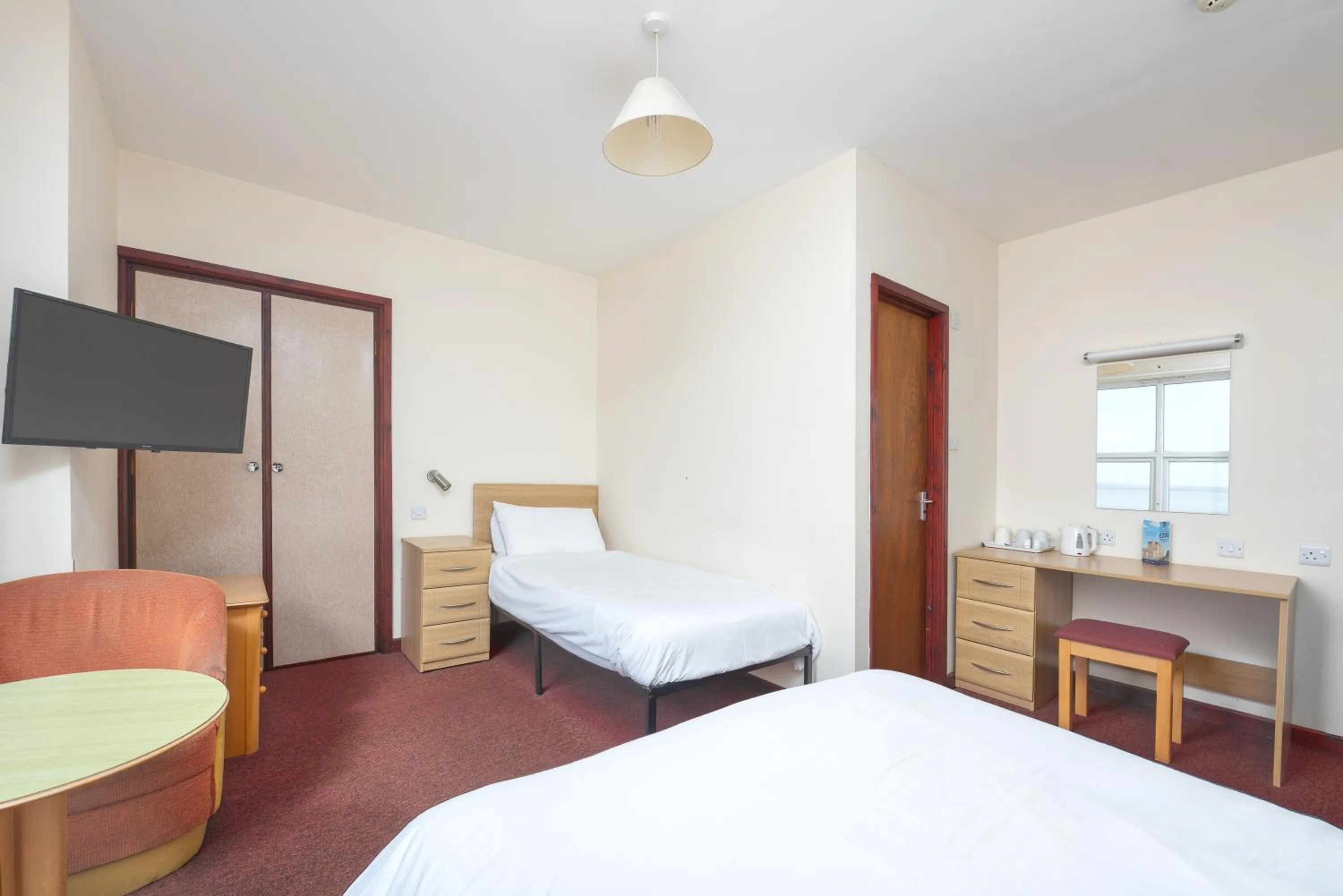 Bed in The Sandringham Hotel