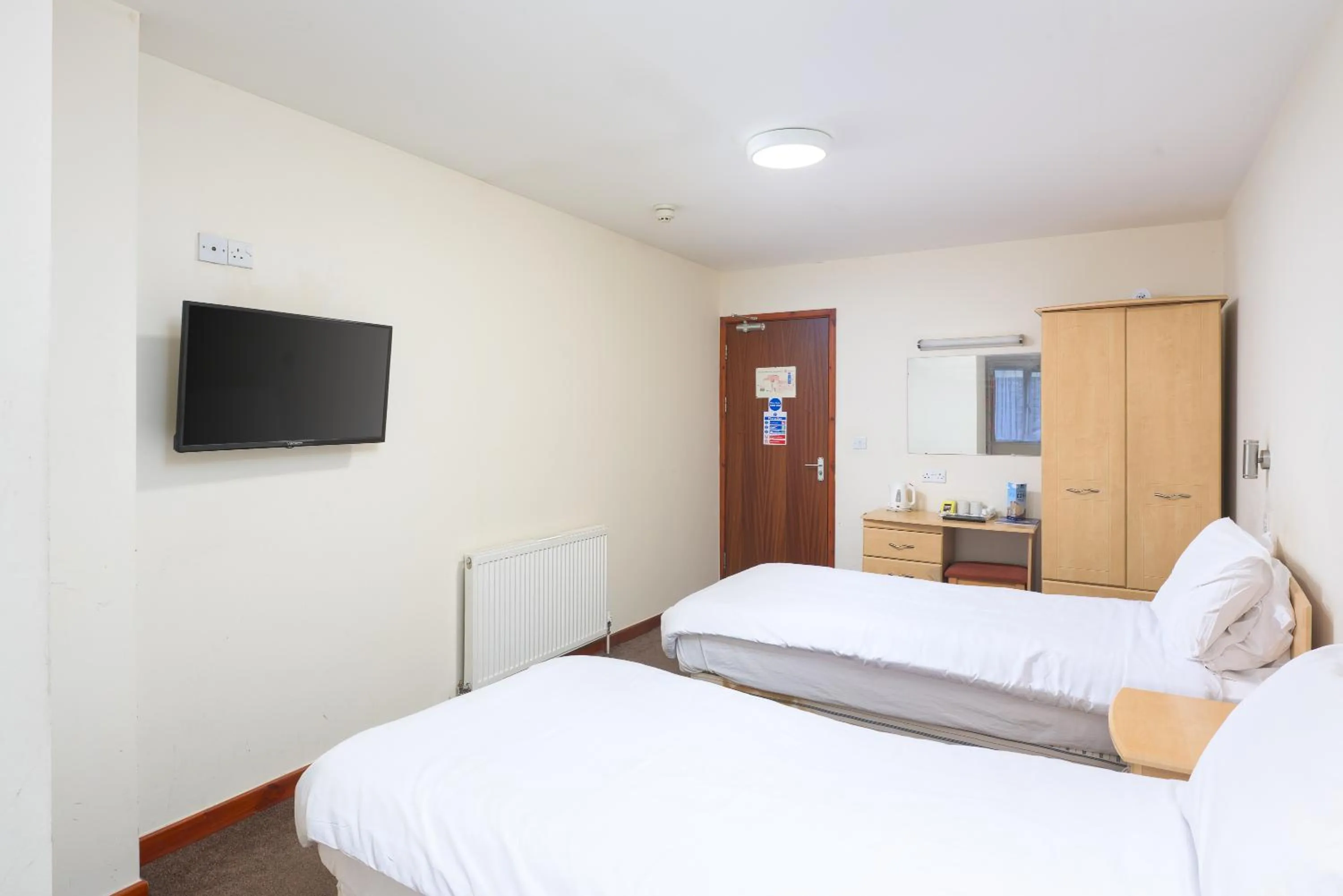 Bed in The Sandringham Hotel