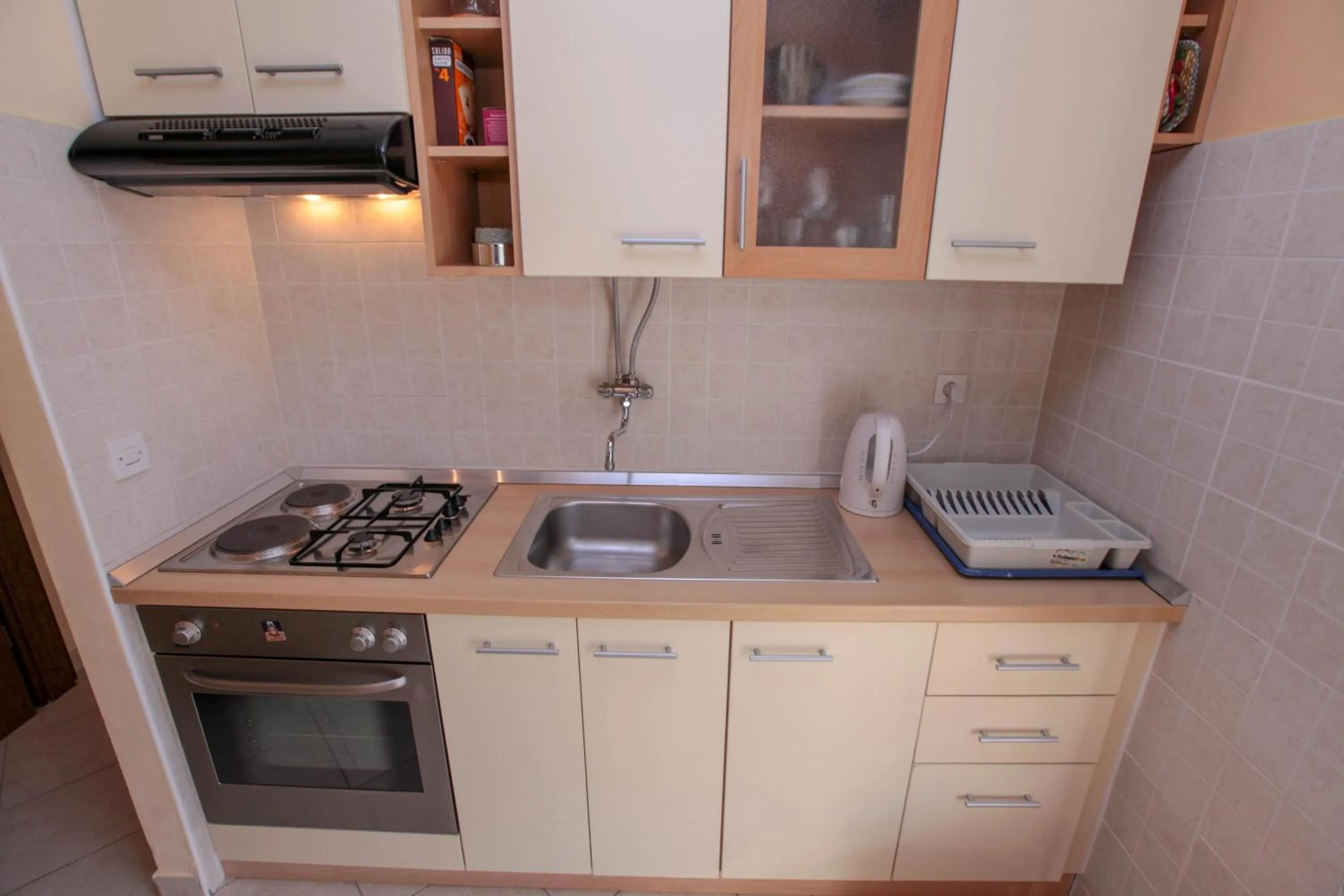 Kitchen or kitchenette in Apartments Mama