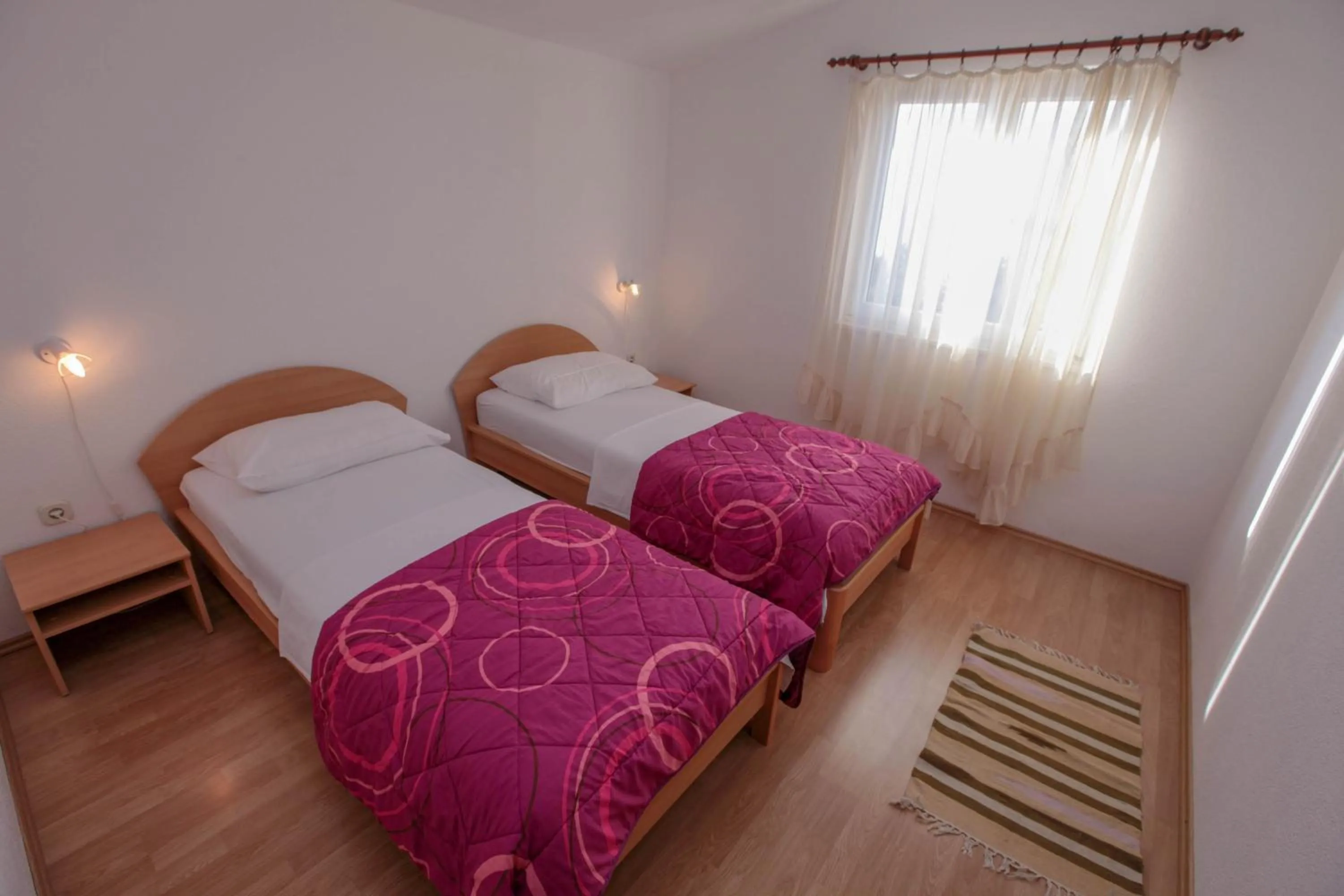 Bed in Apartments Mama
