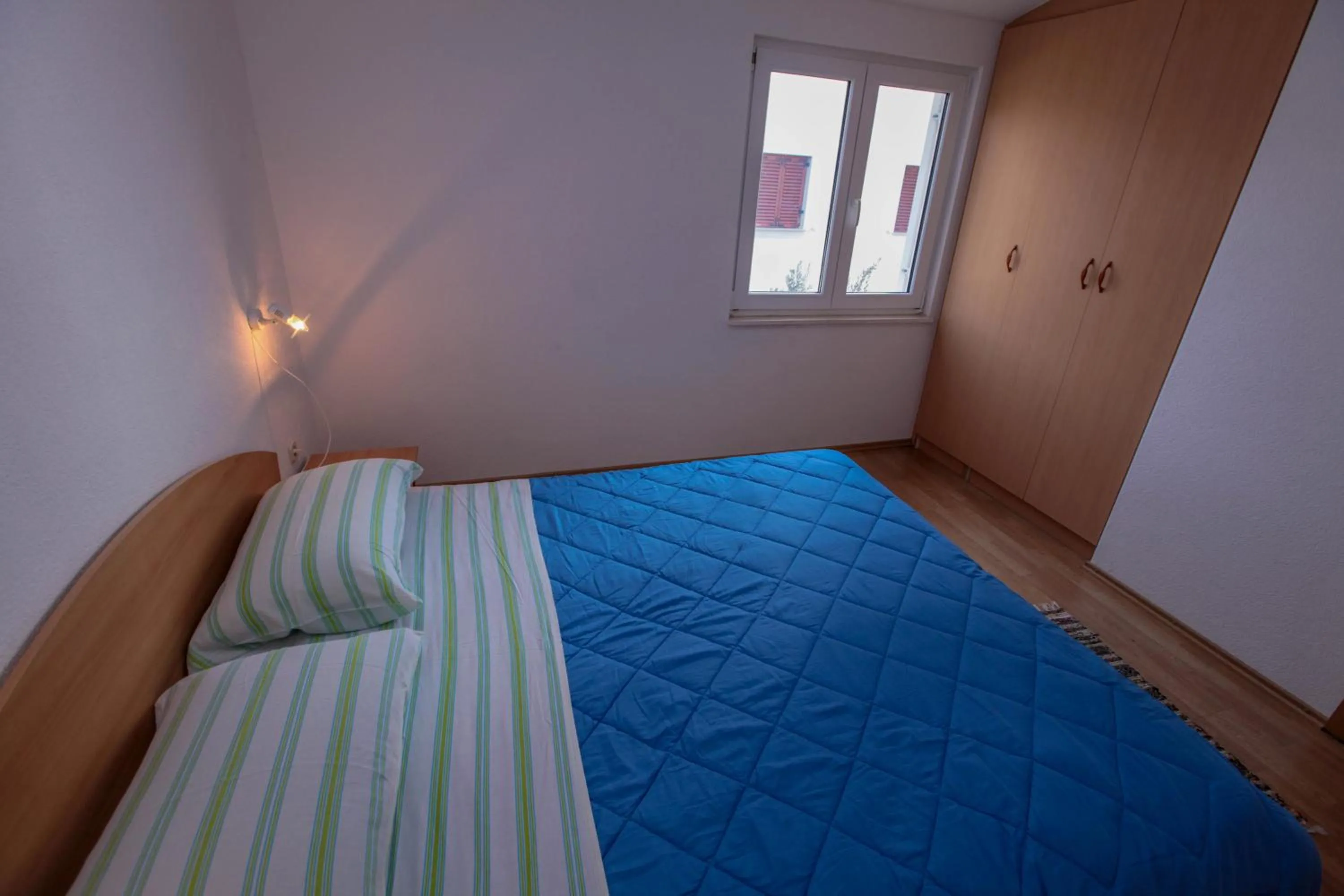 Bed in Apartments Mama