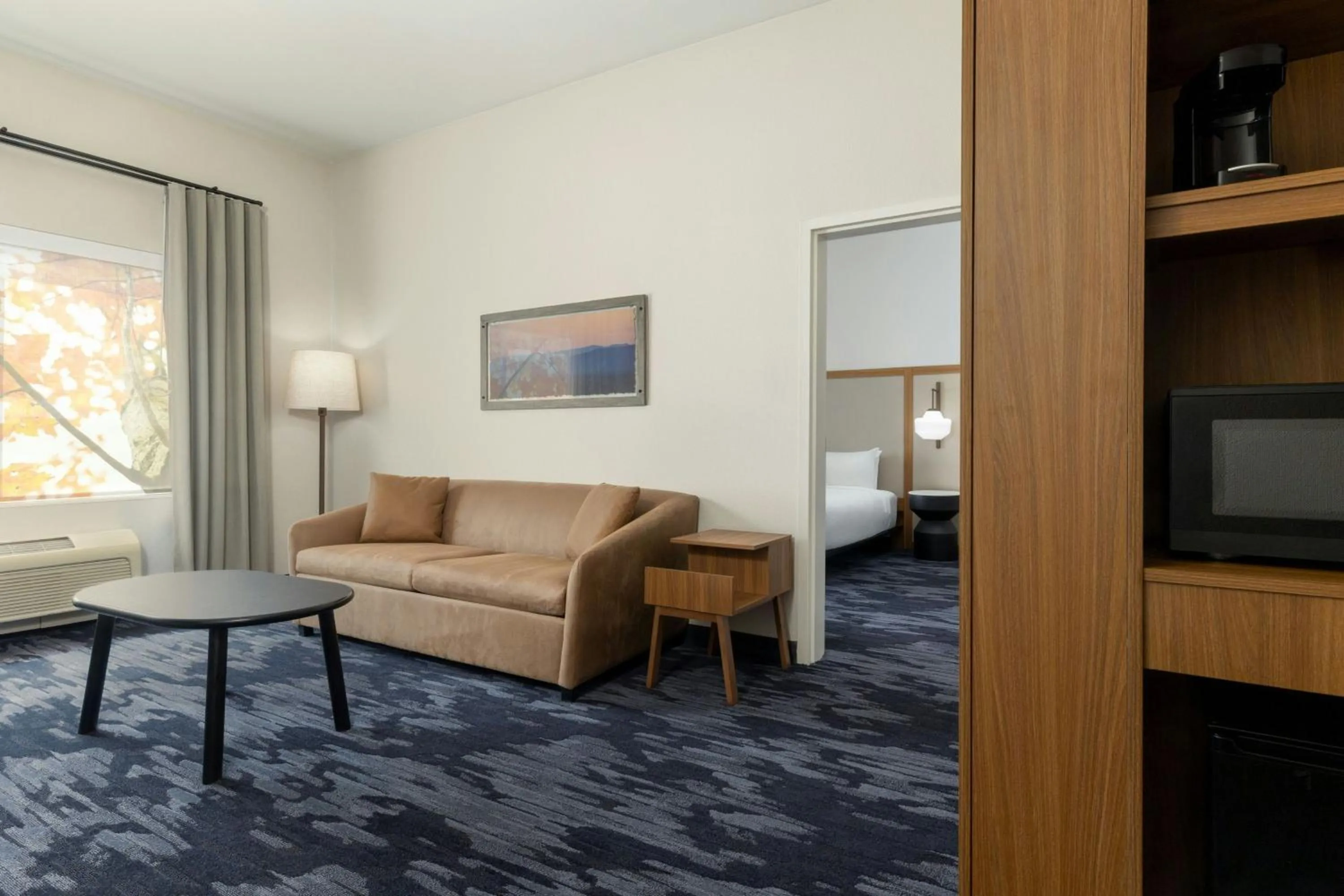 Living room, Bed in Fairfield by Marriott Inn & Suites Spokane Airport