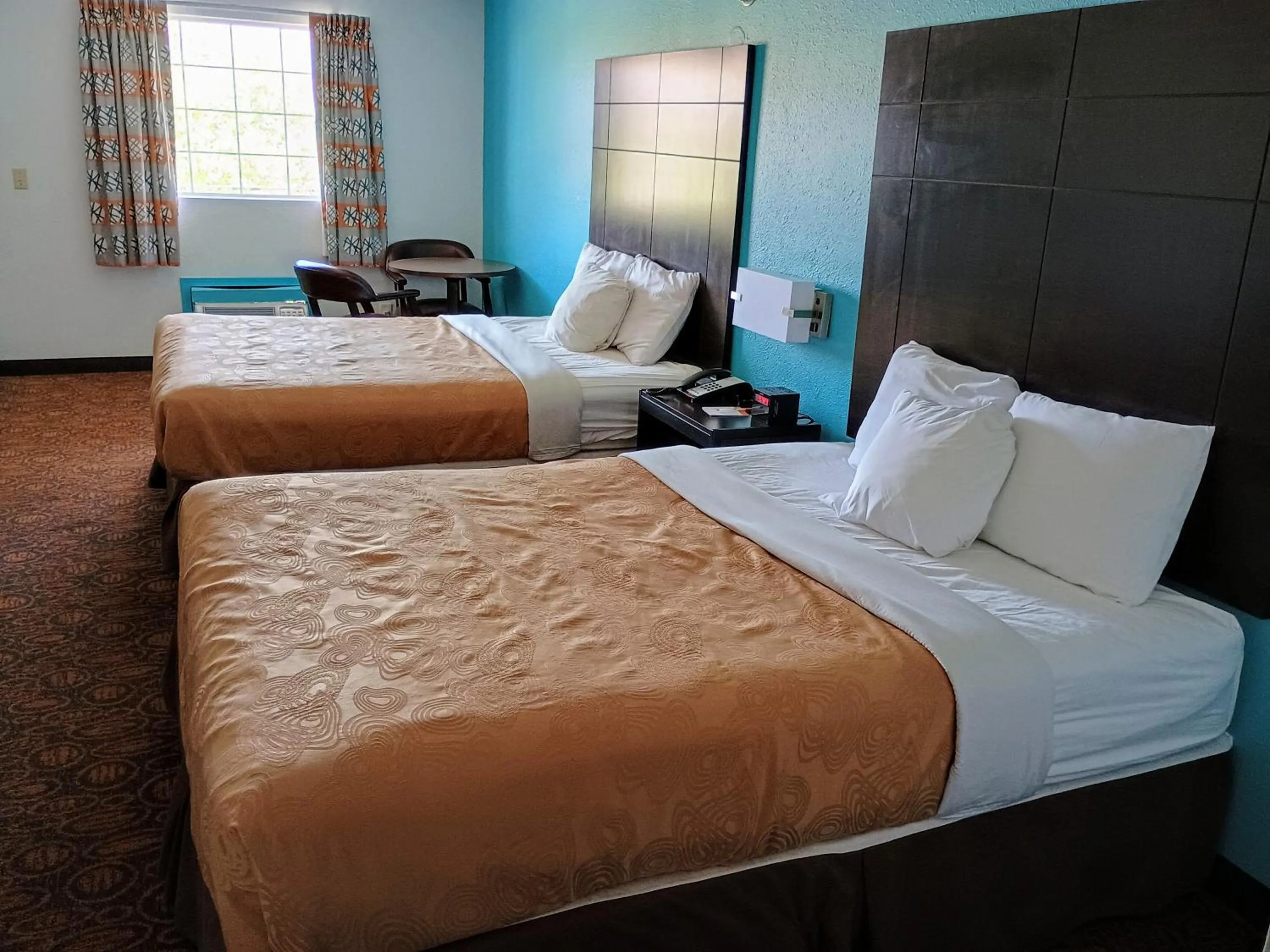 Bedroom, Bed in Howard Johnson by Wyndham Branson Theatre District
