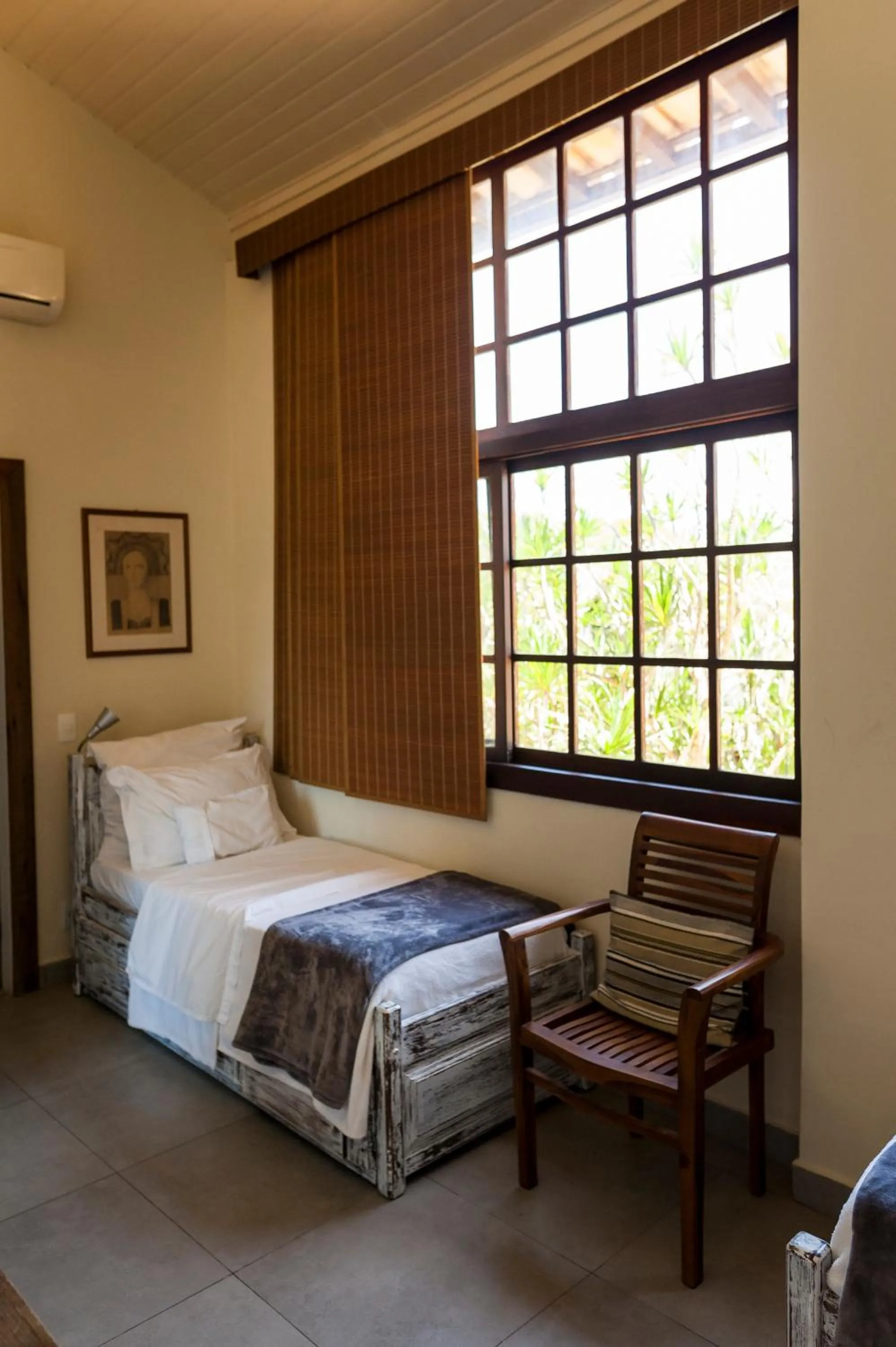 Bed in Pousada da Cyssa