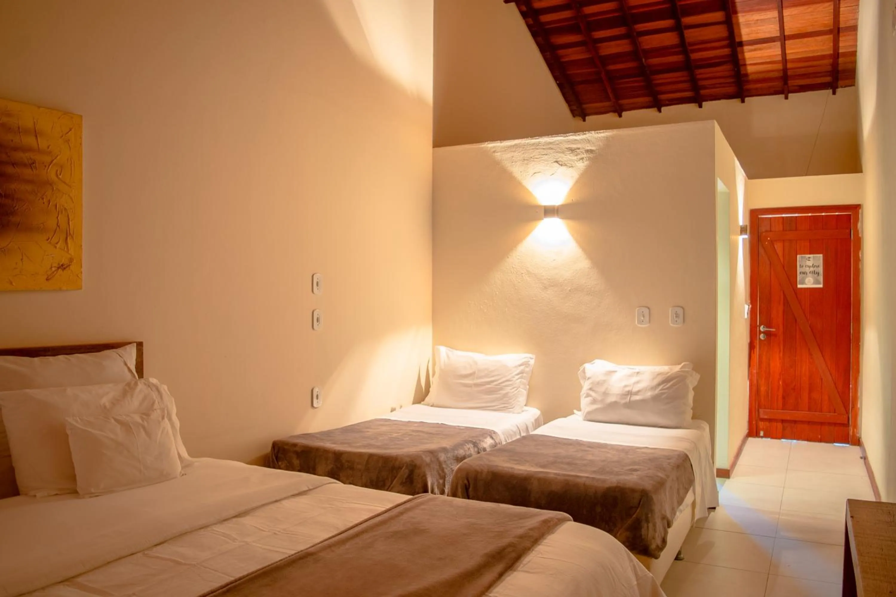 Bed in Pousada da Cyssa