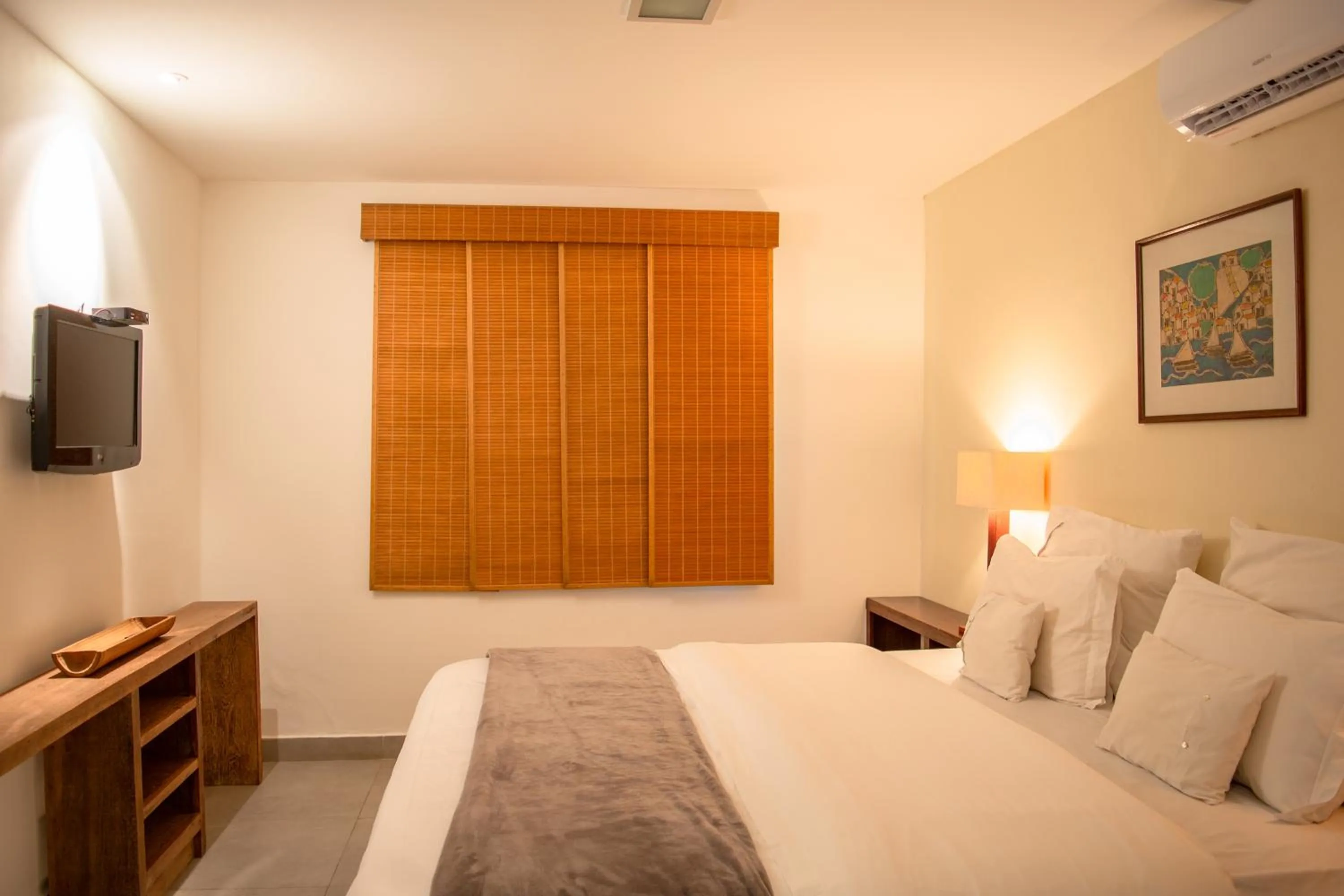 Bed in Pousada da Cyssa