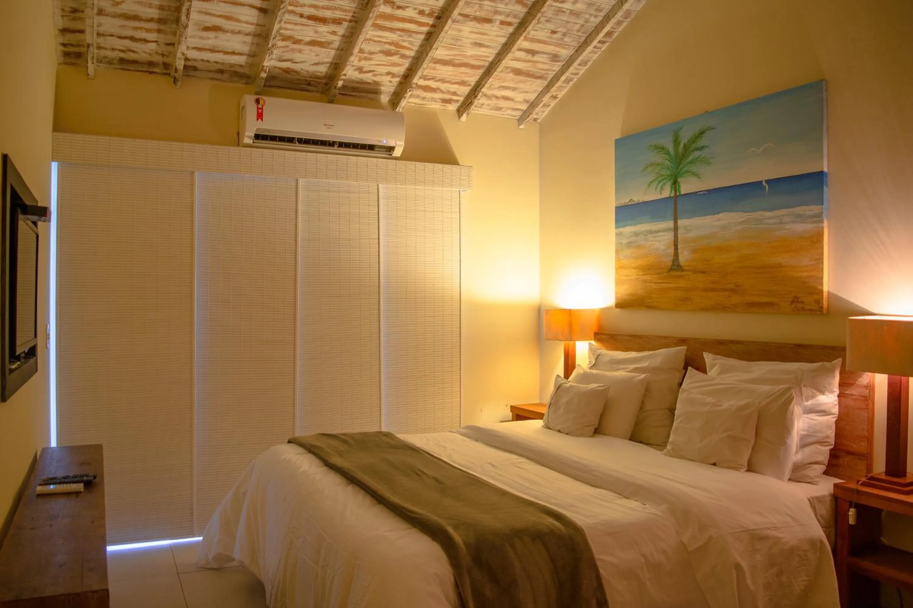 Bed in Pousada da Cyssa