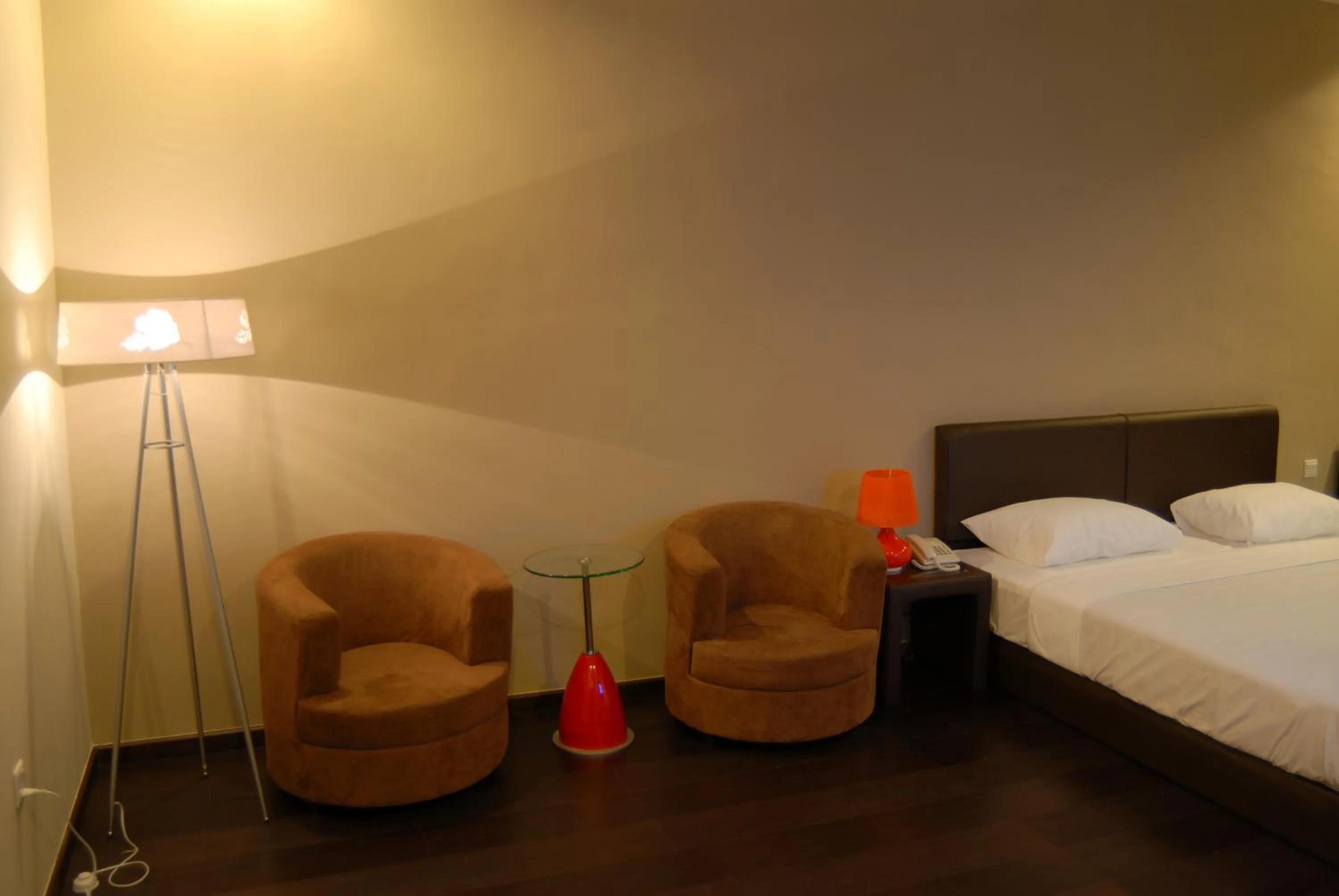 Living room, Bed in Manja Hotel