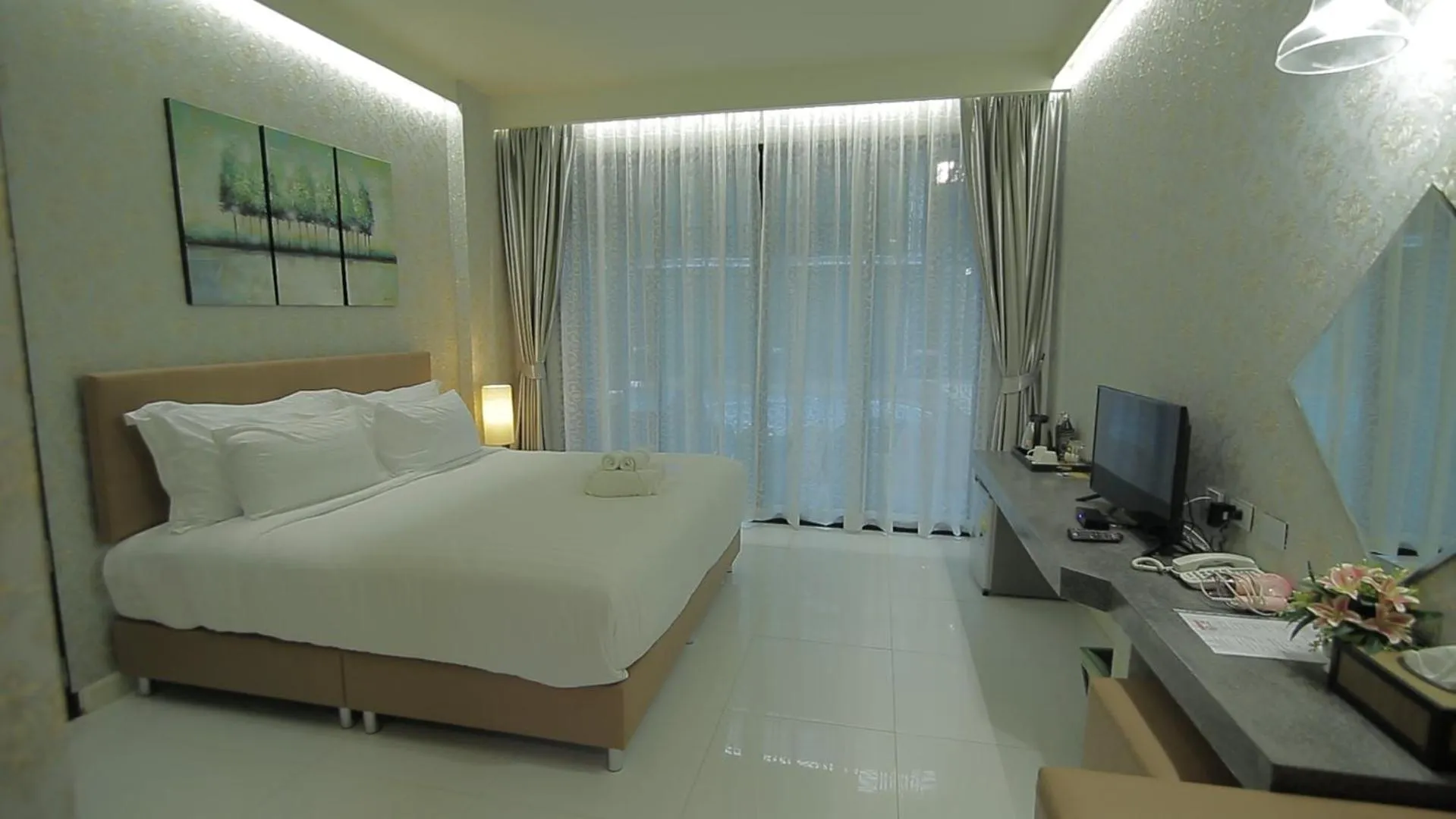 Photo of the whole room, Bed in Namthong Nan Hotel