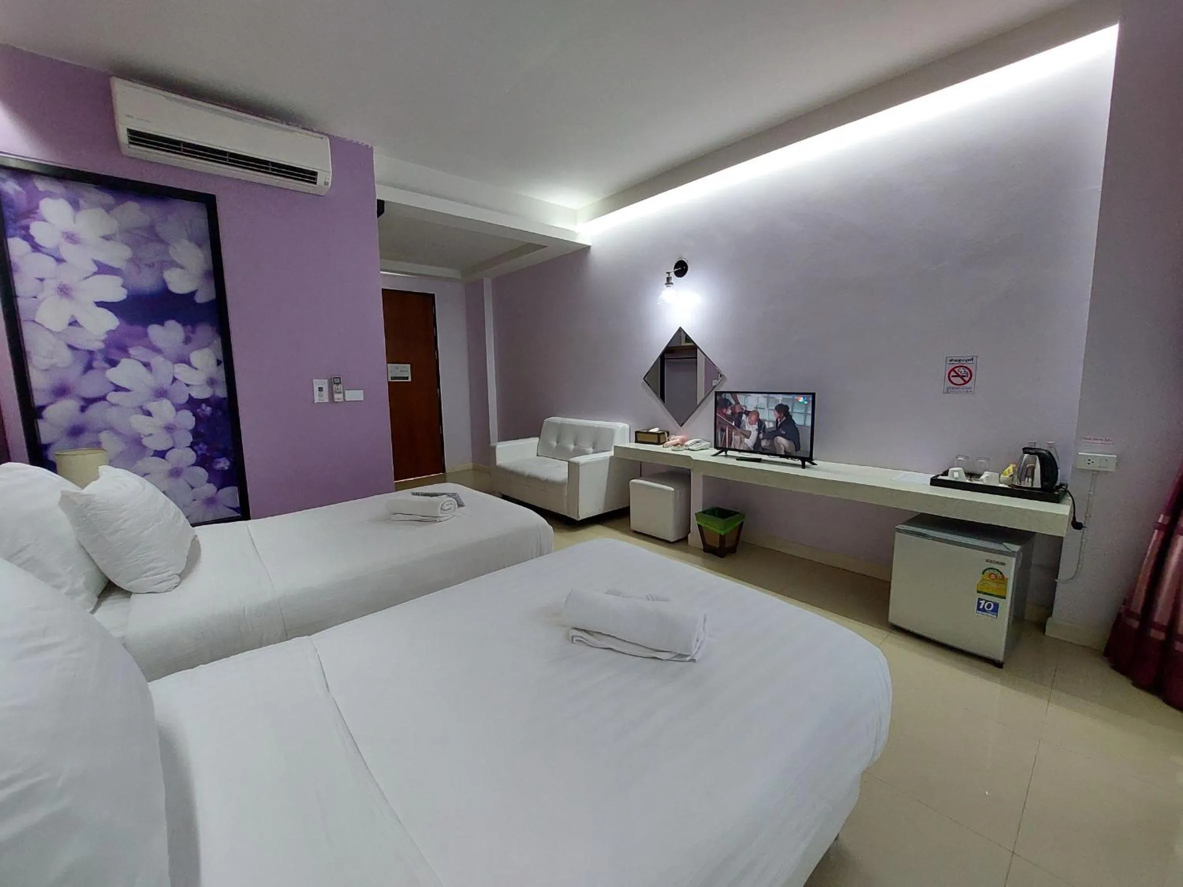 Bed in Namthong Nan Hotel