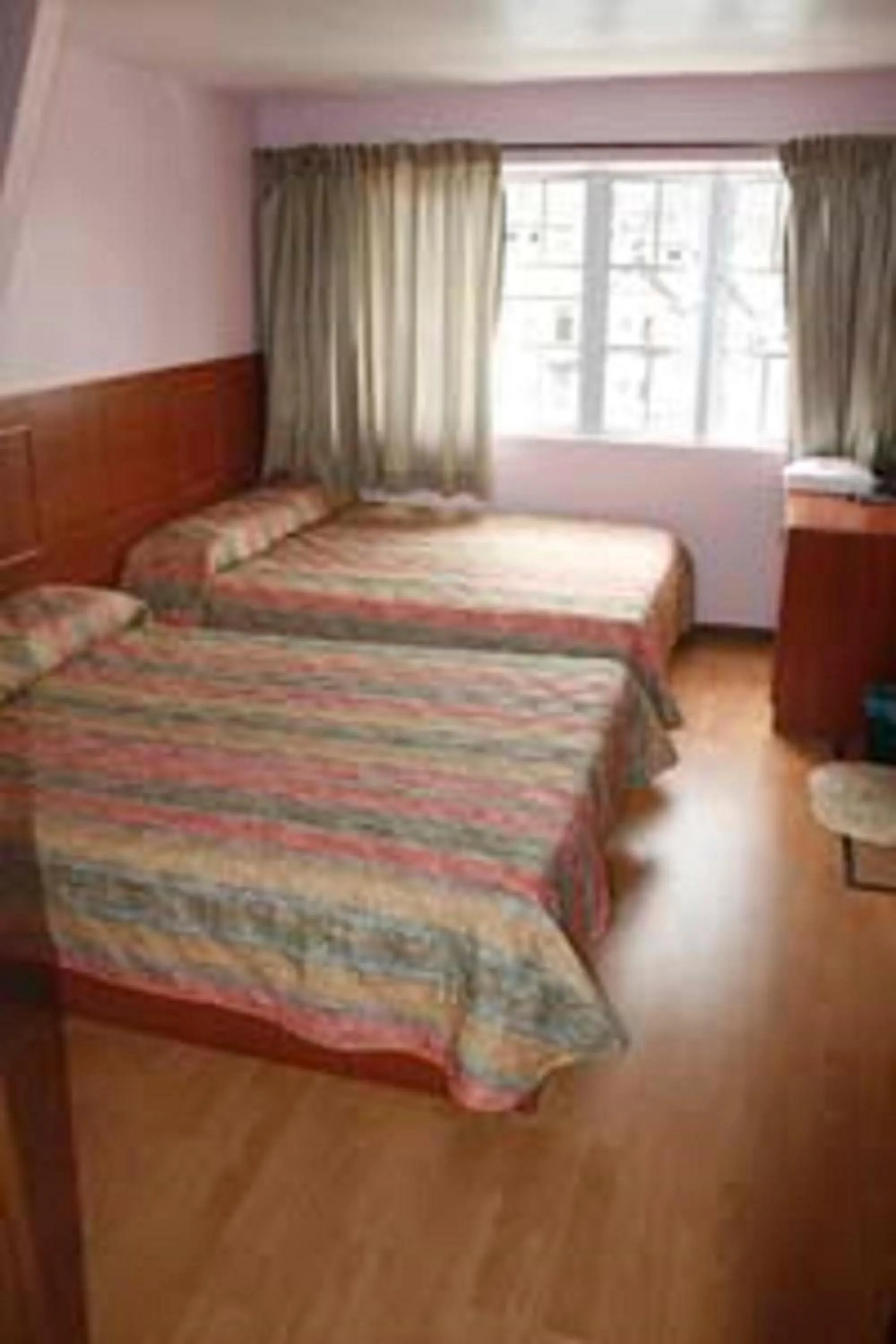 Bed in Golden Night Hotel Cameron Highlands