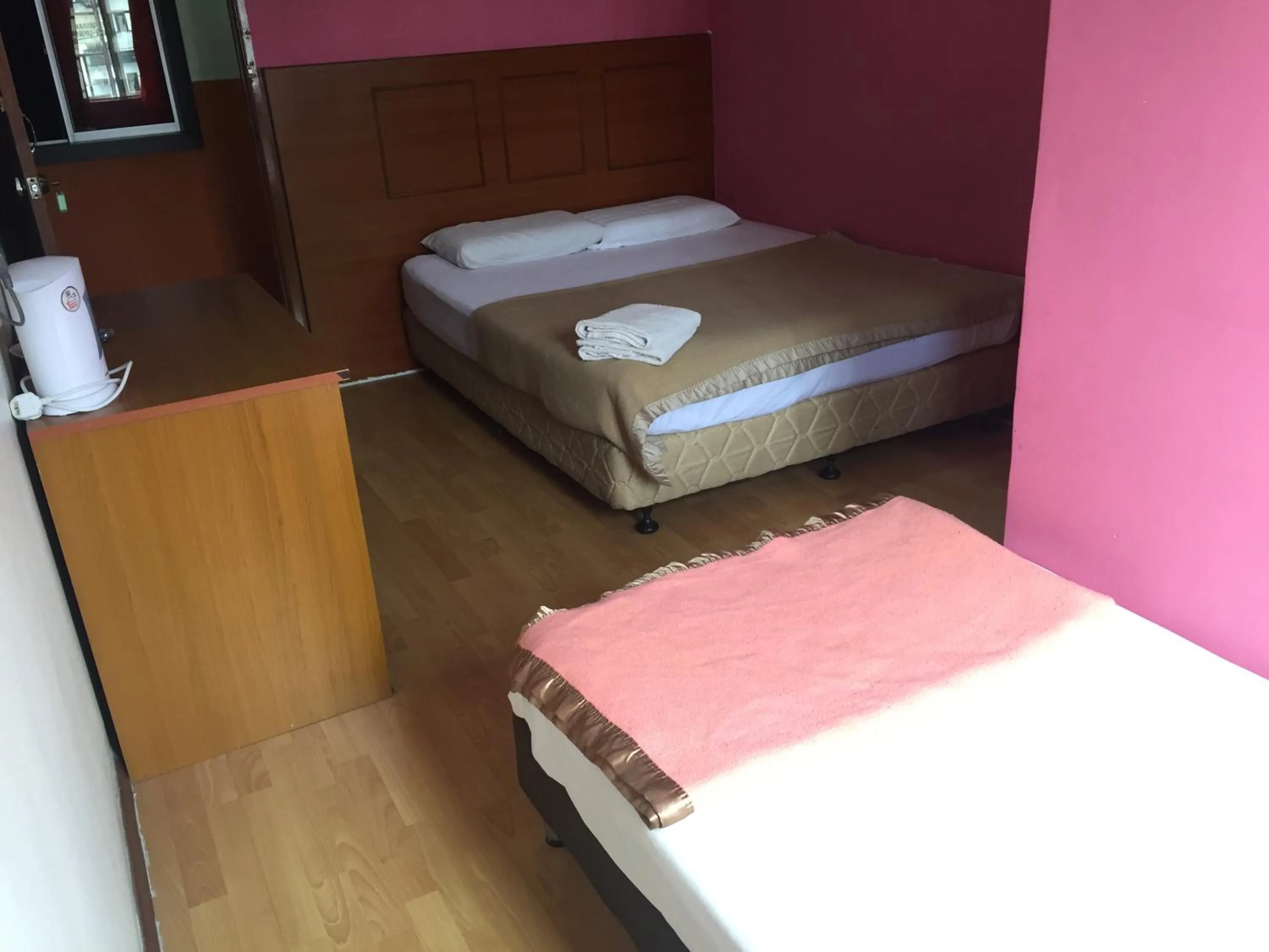 Bed in Golden Night Hotel Cameron Highlands