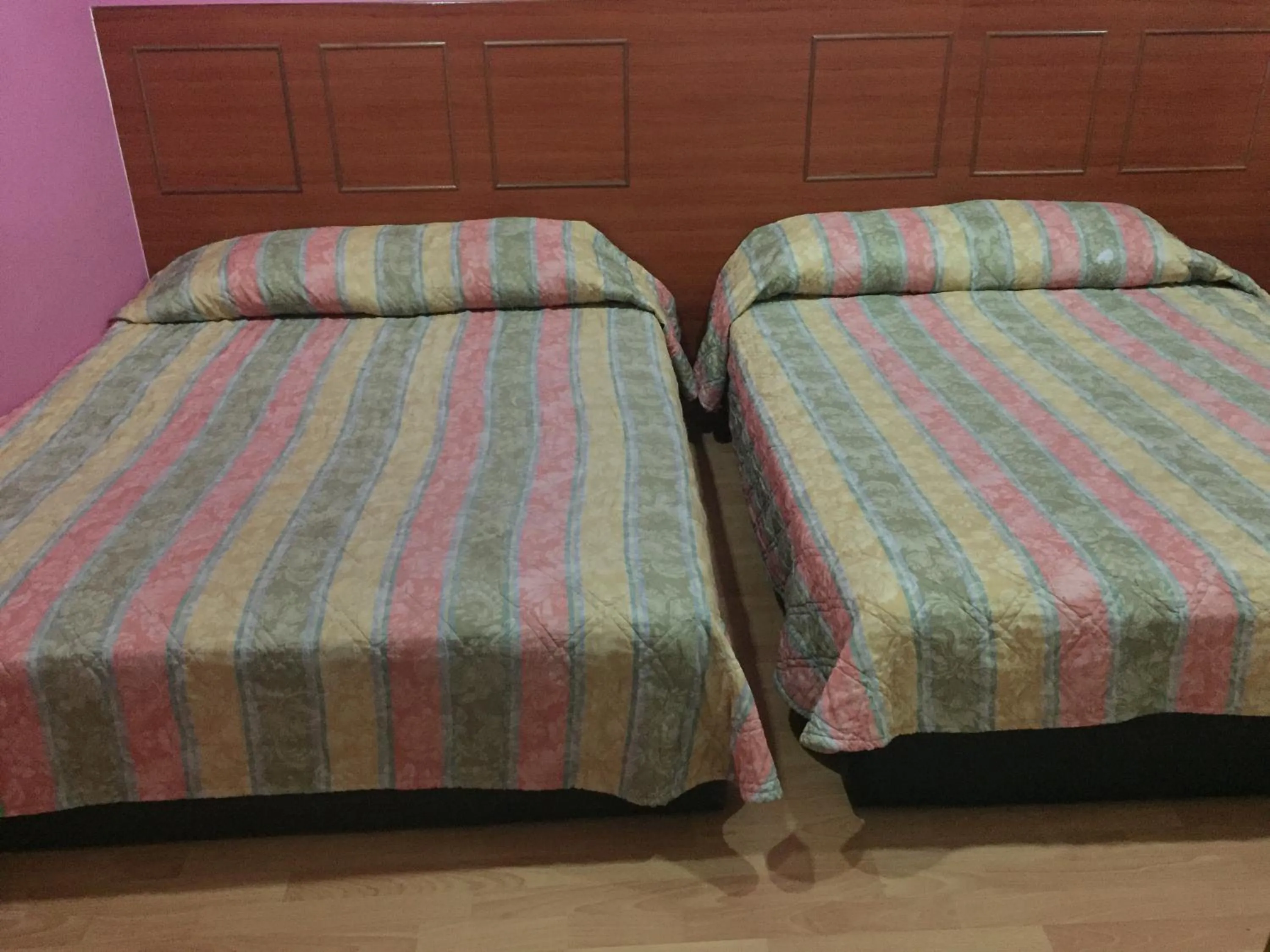 Bed in Golden Night Hotel Cameron Highlands