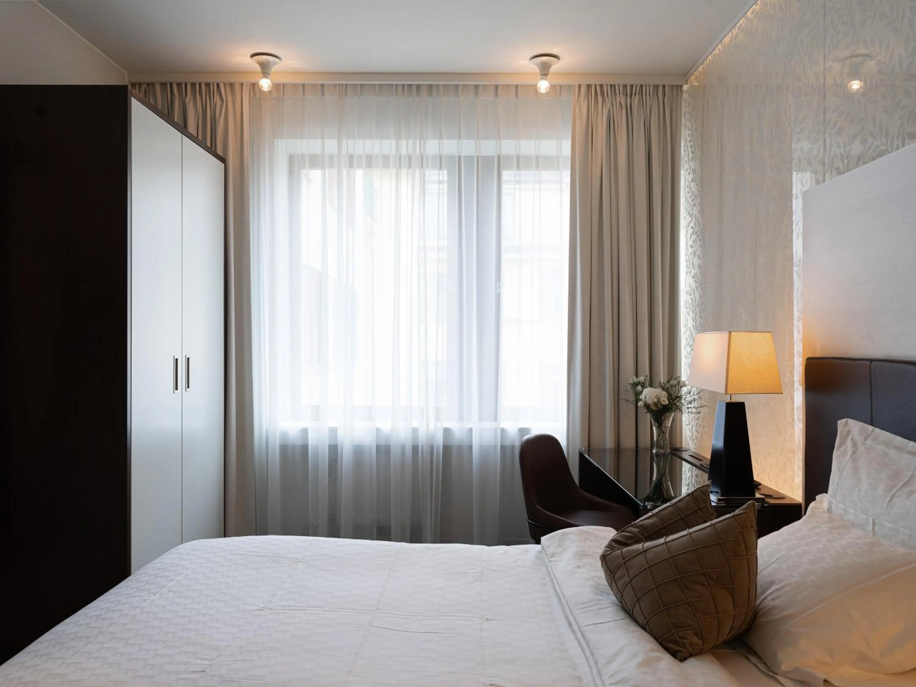 Bed in Elite Eden Park Hotel