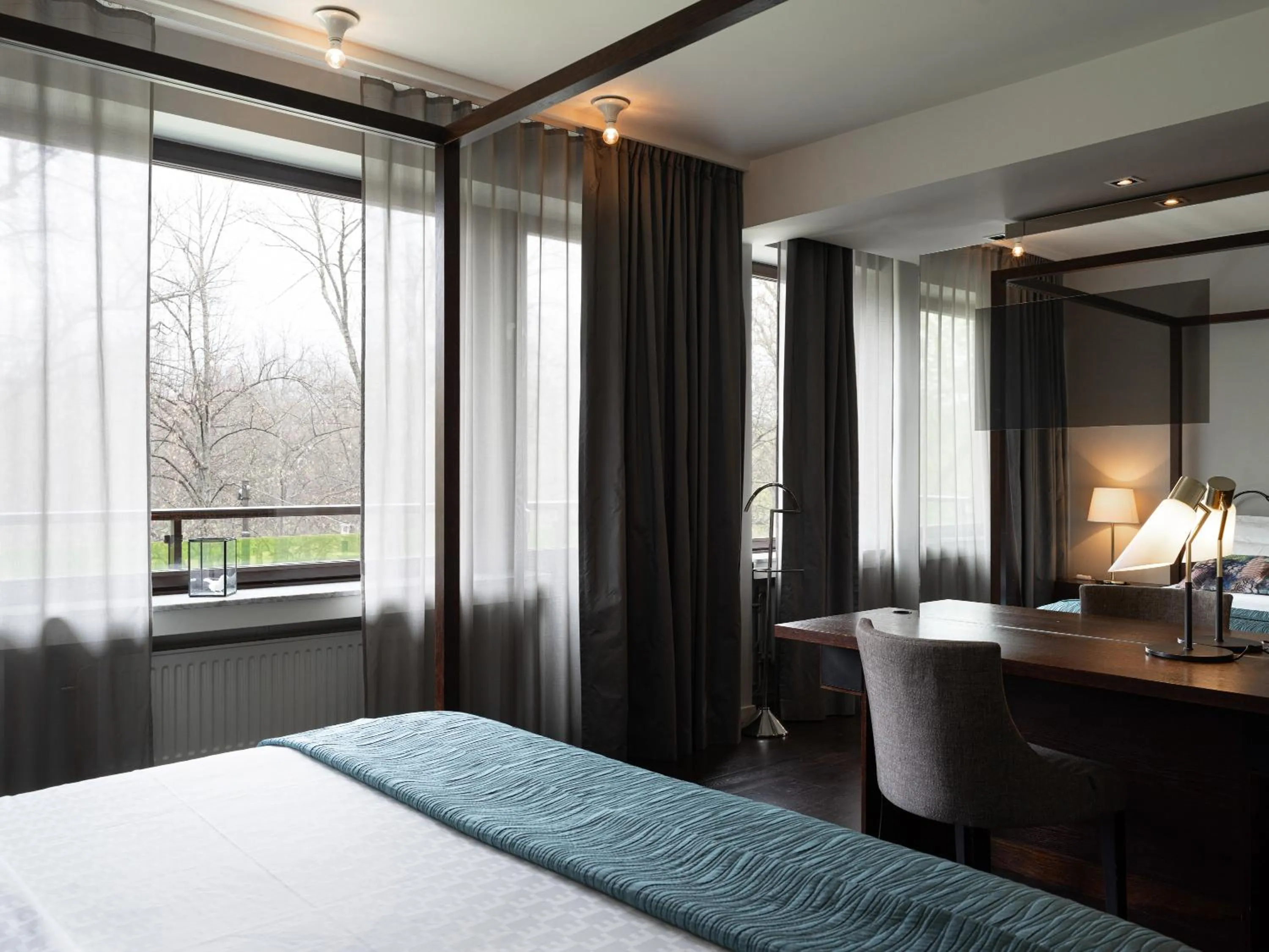 Bed in Elite Eden Park Hotel