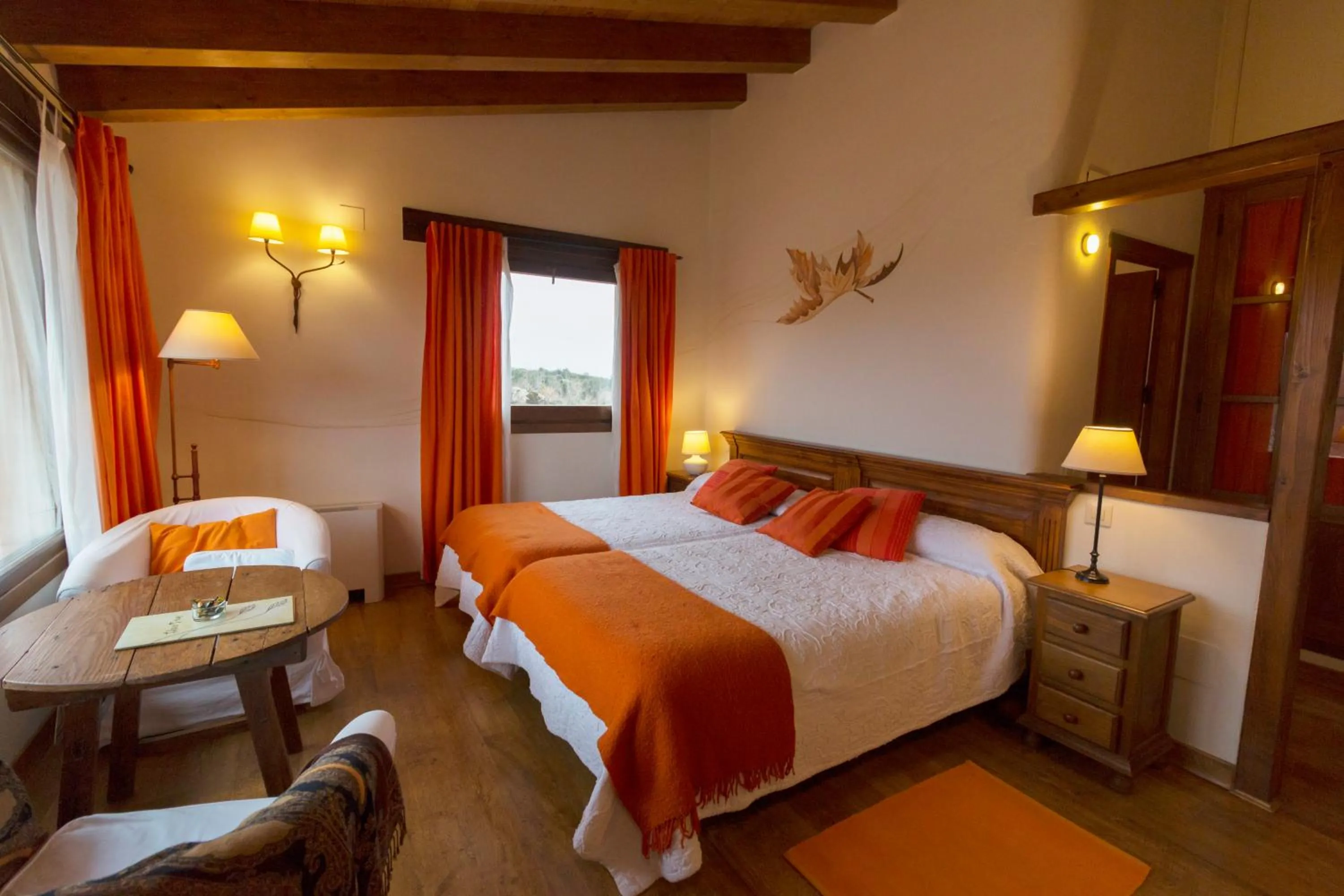 Seating area, Bed in Hotel Llano Tineo