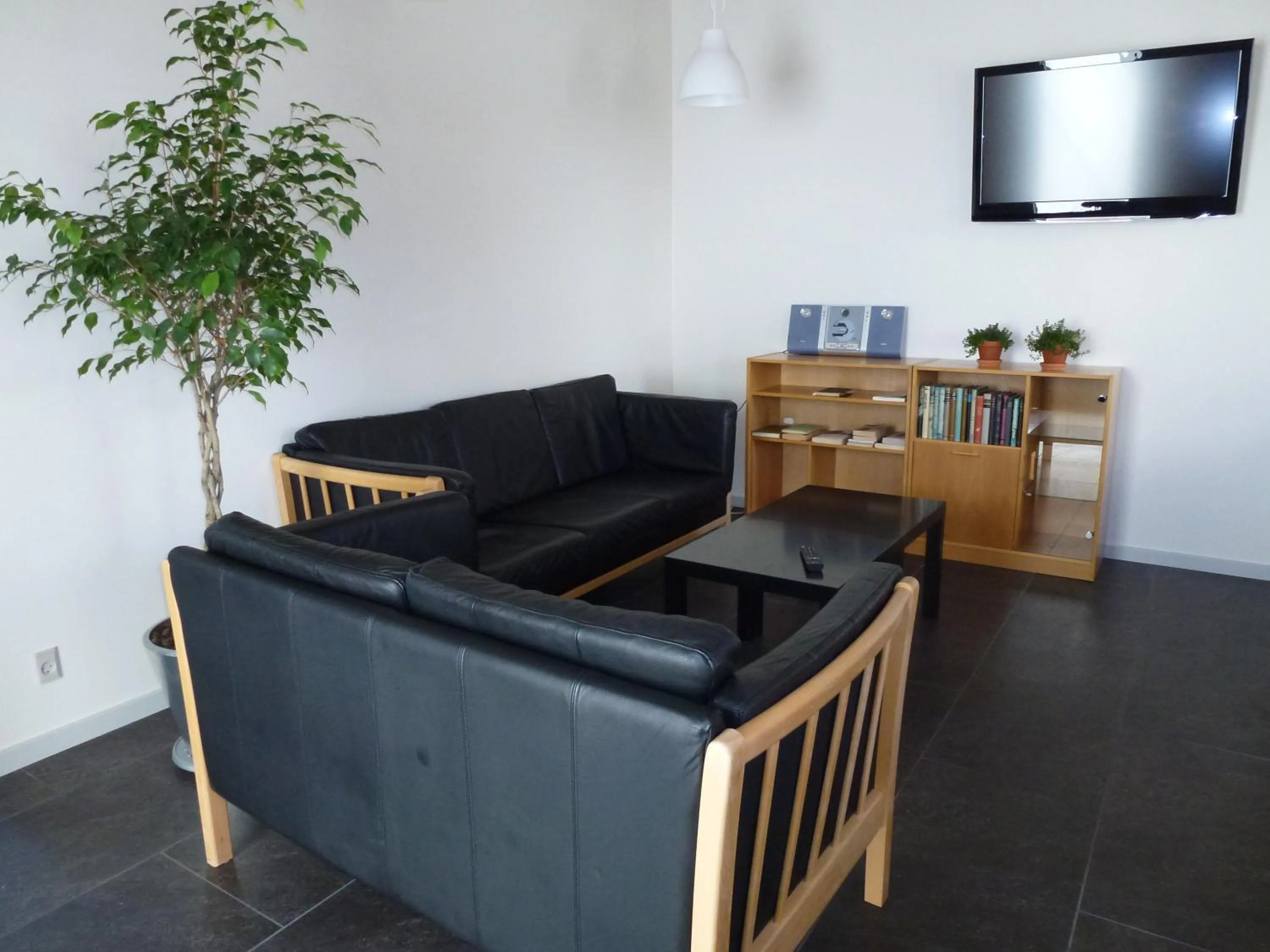 Communal lounge/ TV room in Danhostel Frederikshavn City