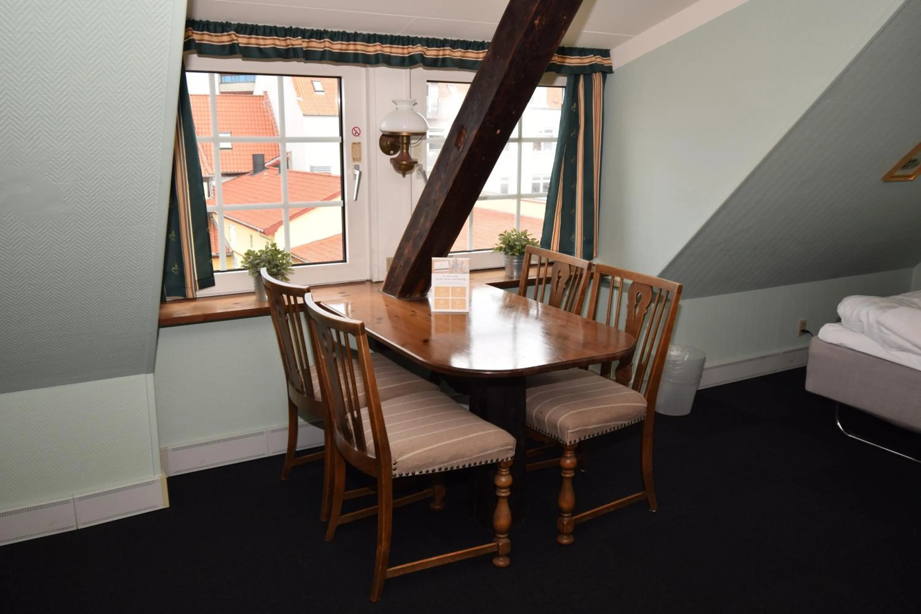Seating area, Bed in Danhostel Frederikshavn City