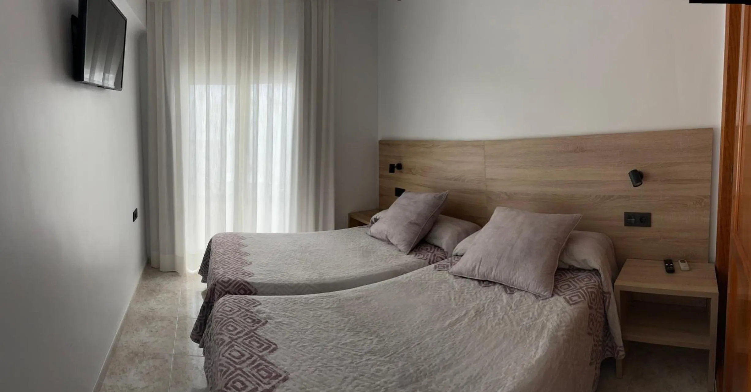 Bed in Hostal Juan Carlos