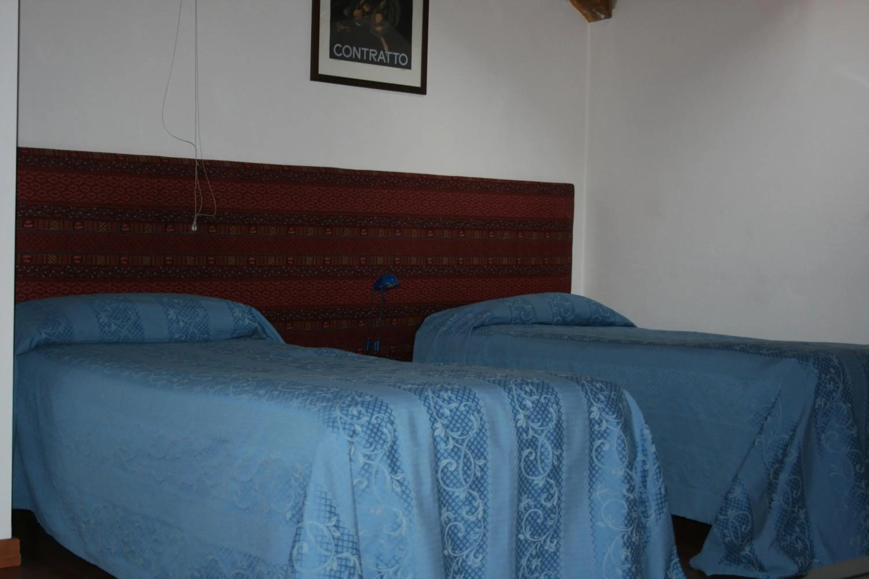 Photo of the whole room, Bed in Albergo Cavallino