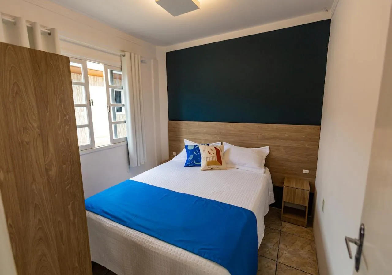 Bed in Pousada Nossa Senhora de Fatima