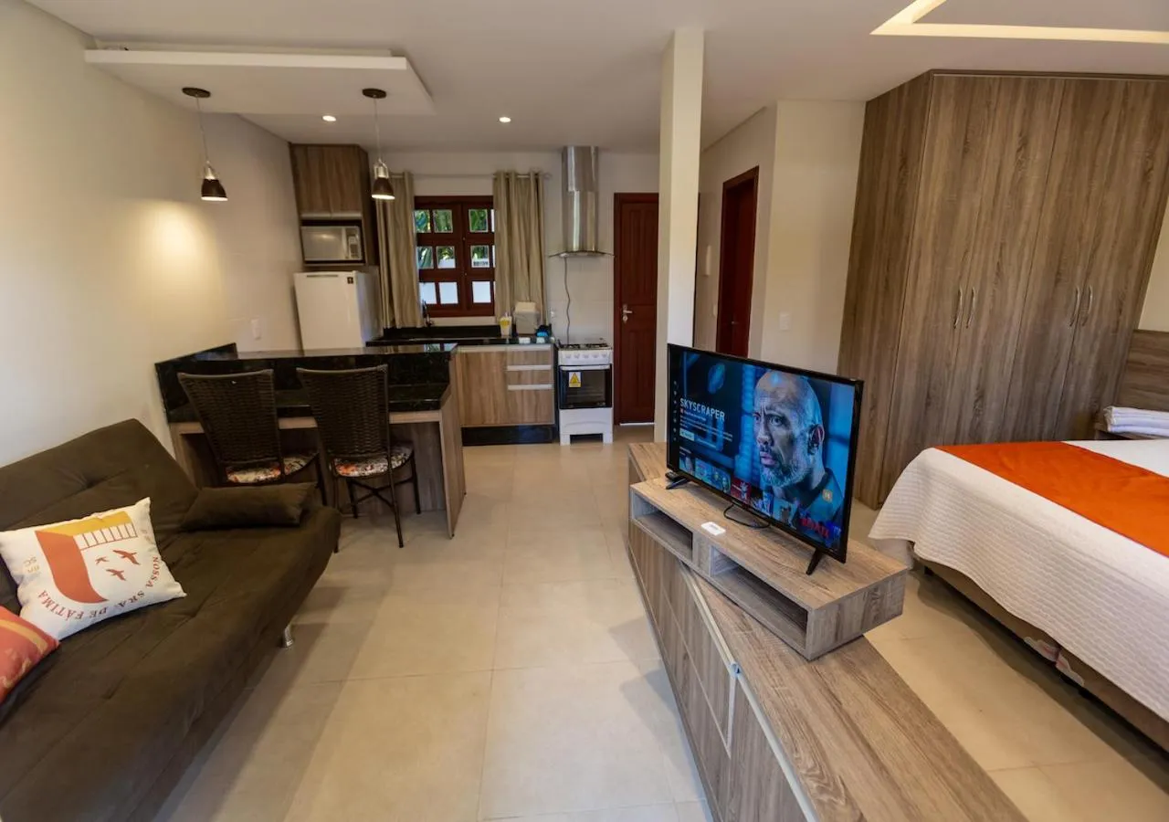 Communal lounge/ TV room, Bed in Pousada Nossa Senhora de Fatima