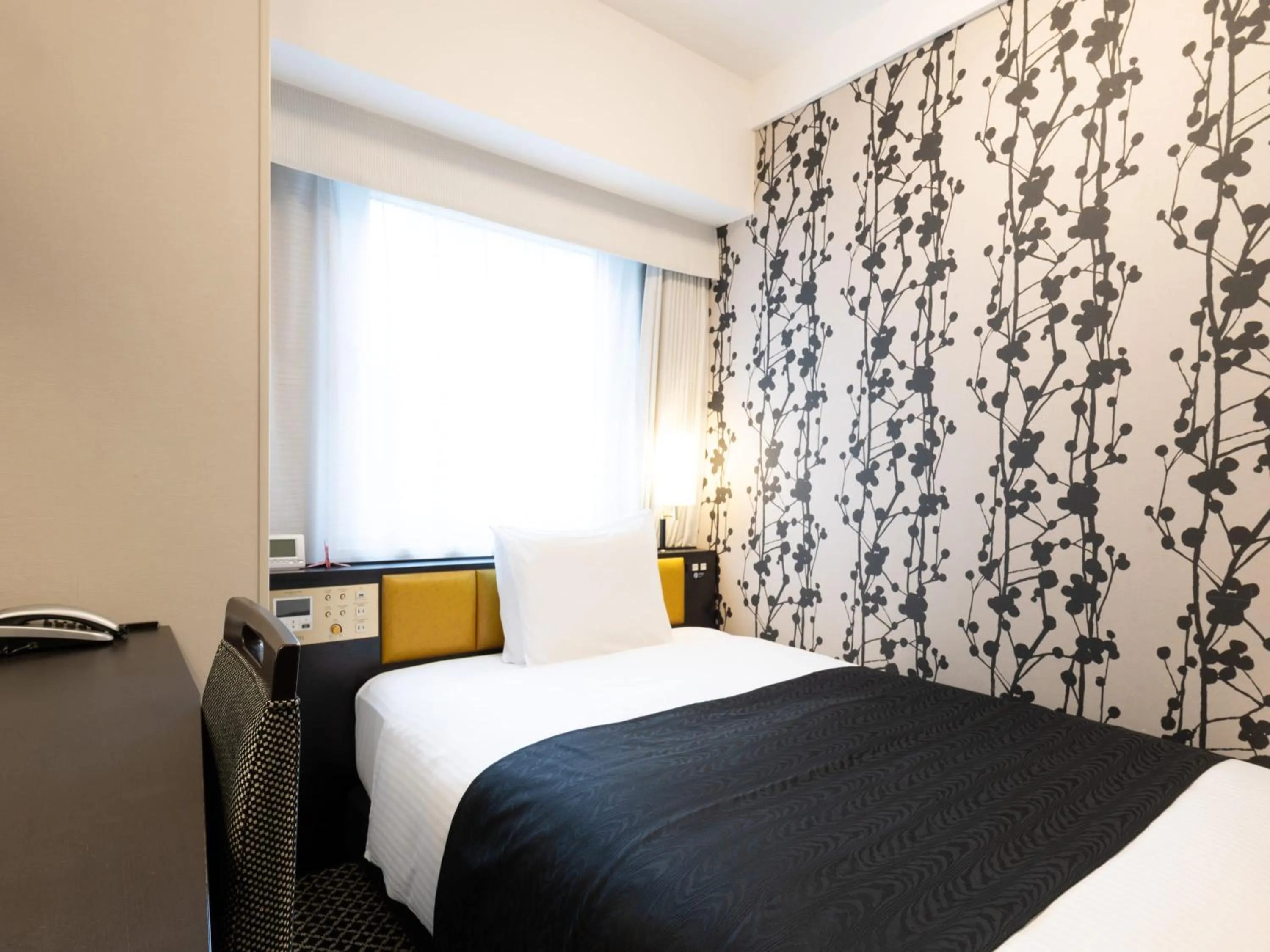 Photo of the whole room, Bed in APA Hotel Shin Osaka Ekiminami