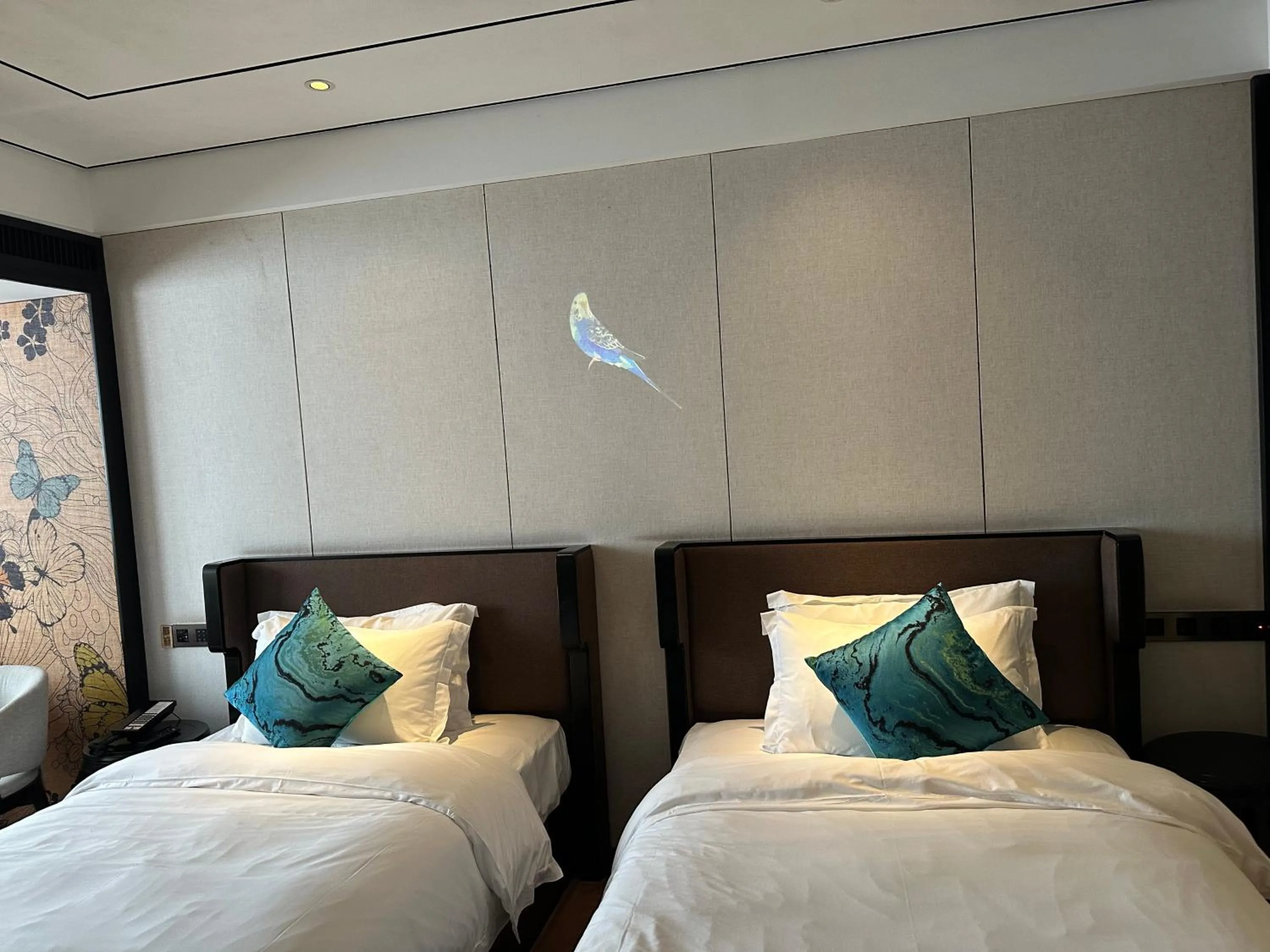 Bed in Paco Hotel GuangZhou Zoo Metro Branch