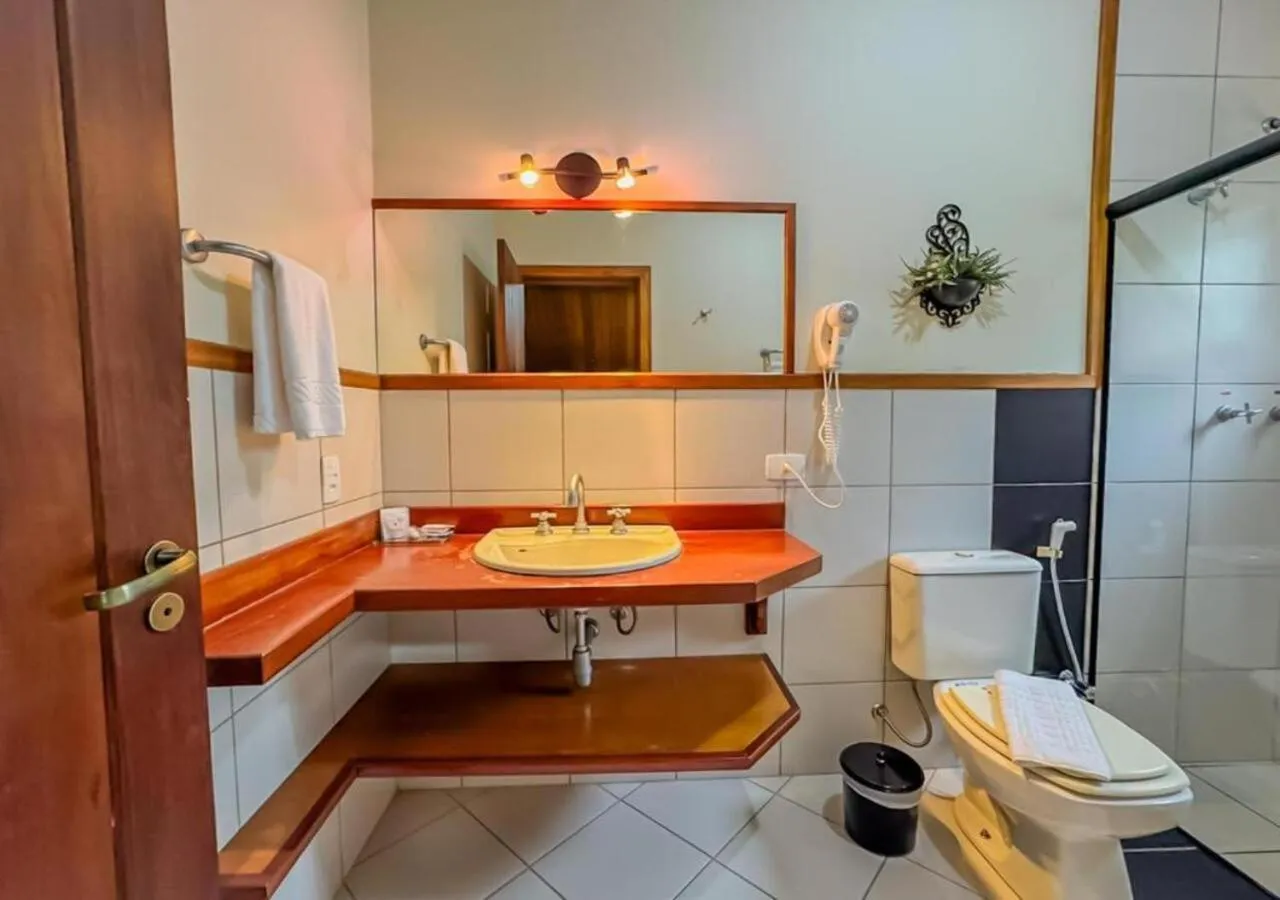 Bathroom in Pousada Victoria Villa By Nacional Inn - A 800 metros da Vila Capivari