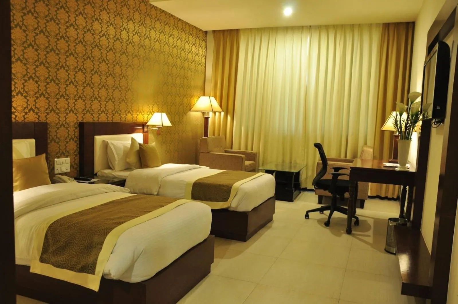 Bed in Hotel Devashish Haldwani