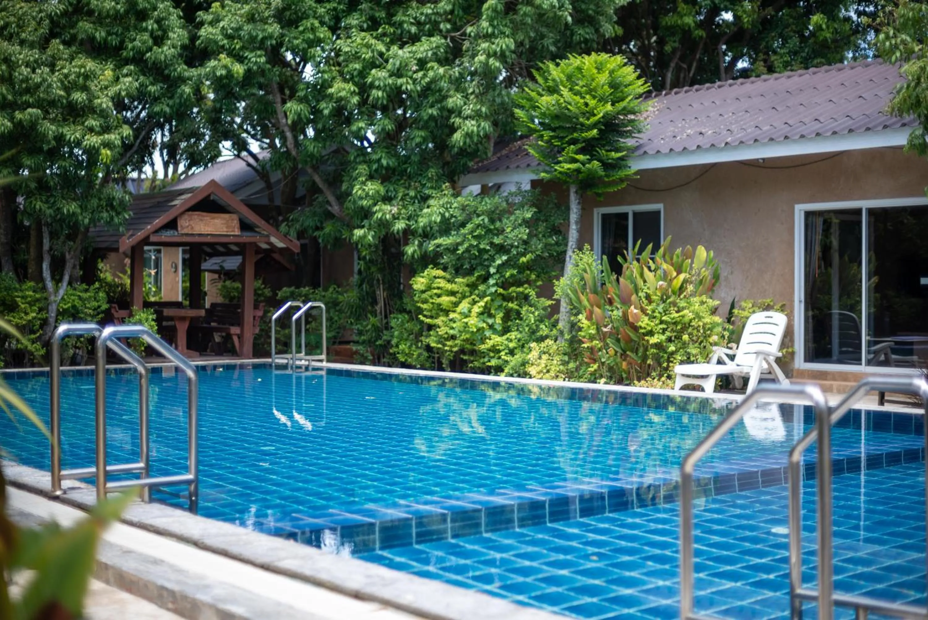 Swimming pool in Muntra Garden Resort