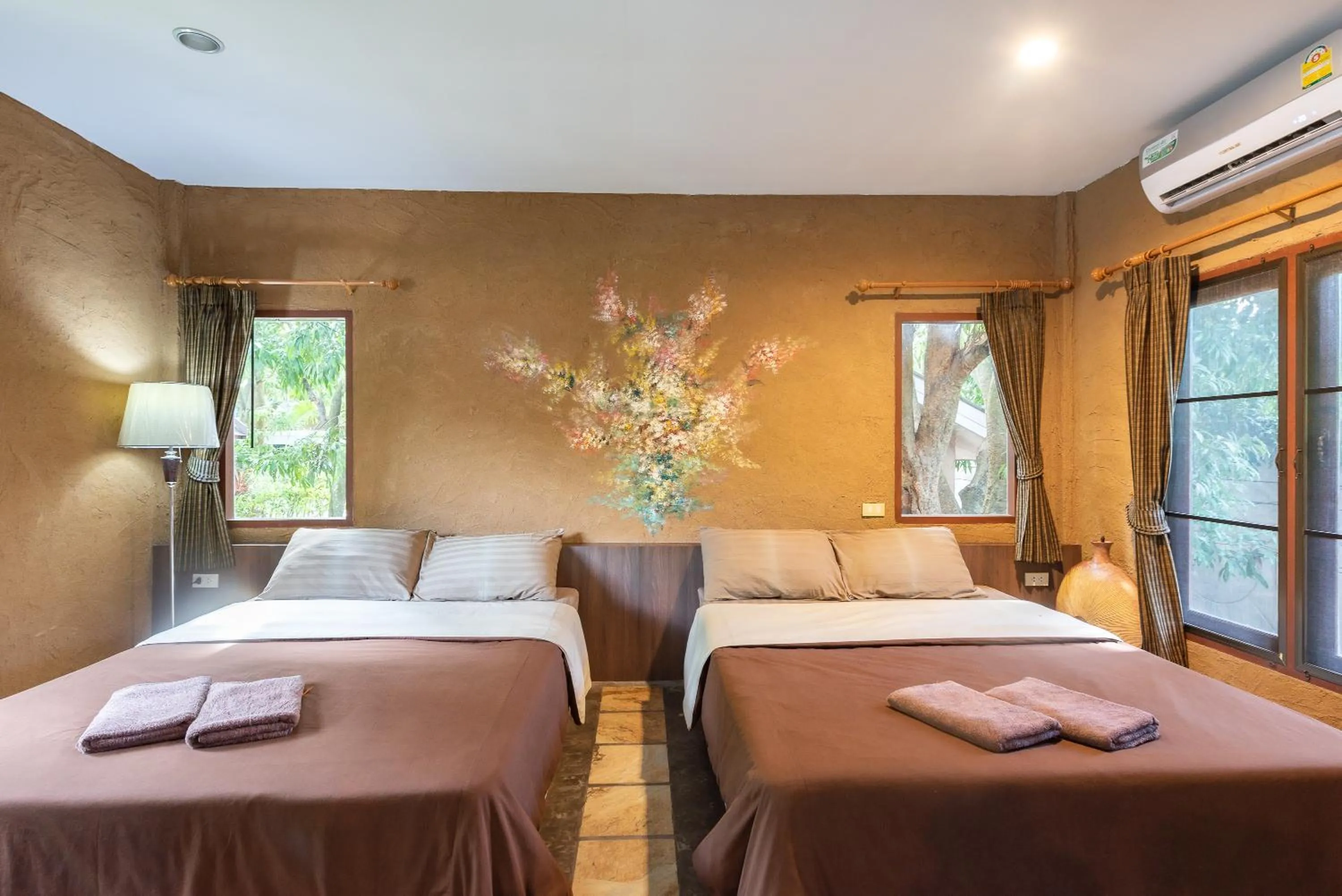 Bed in Muntra Garden Resort