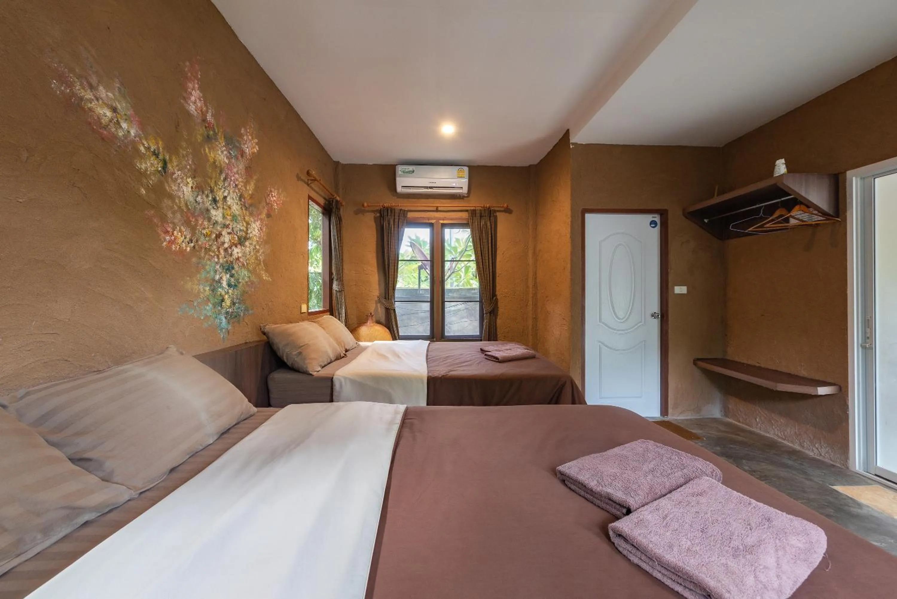 Bed in Muntra Garden Resort