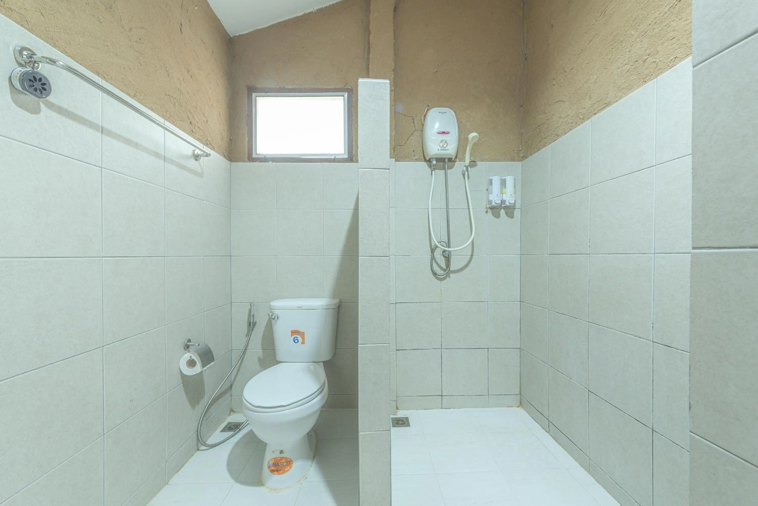 Shower in Muntra Garden Resort