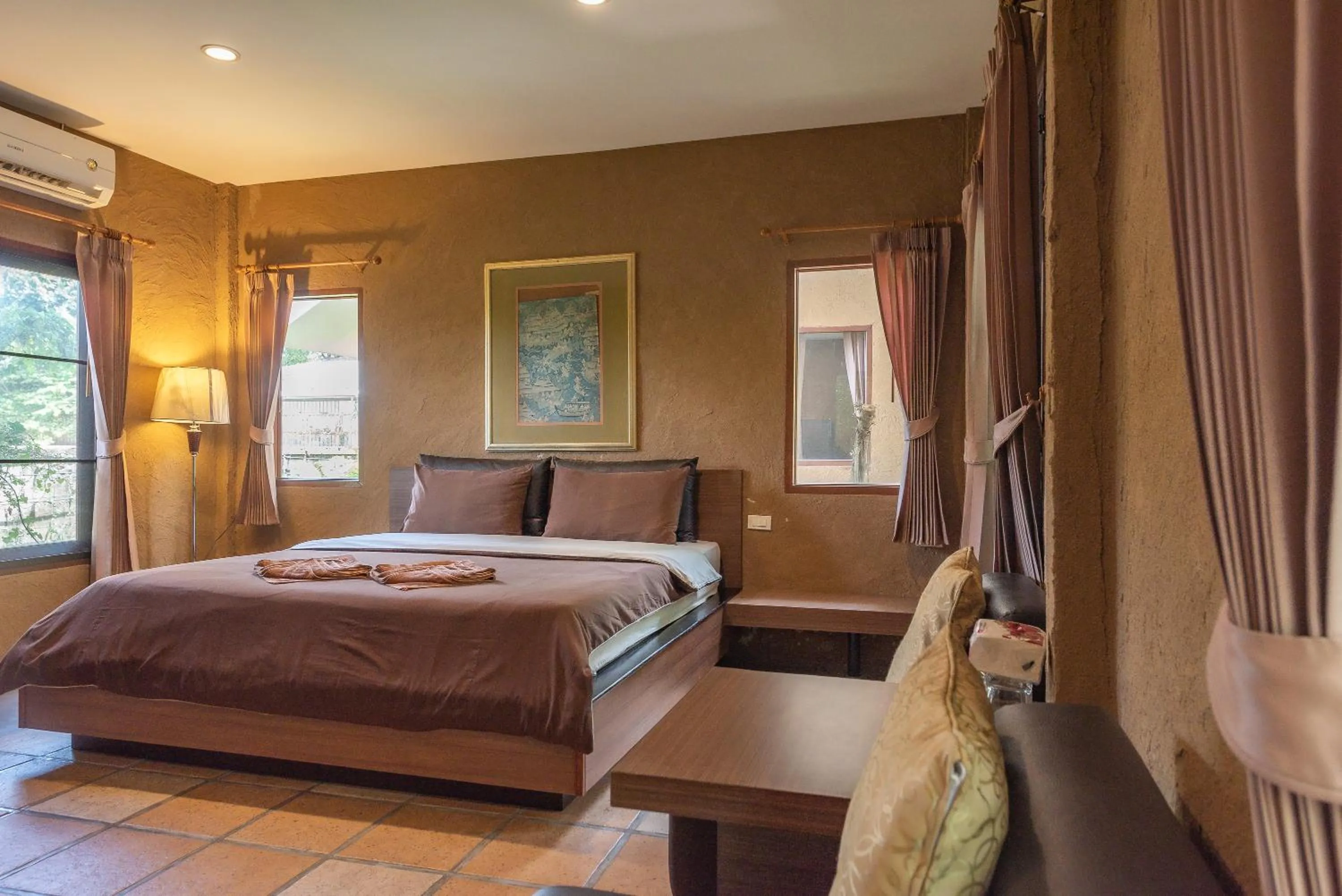 Bed in Muntra Garden Resort