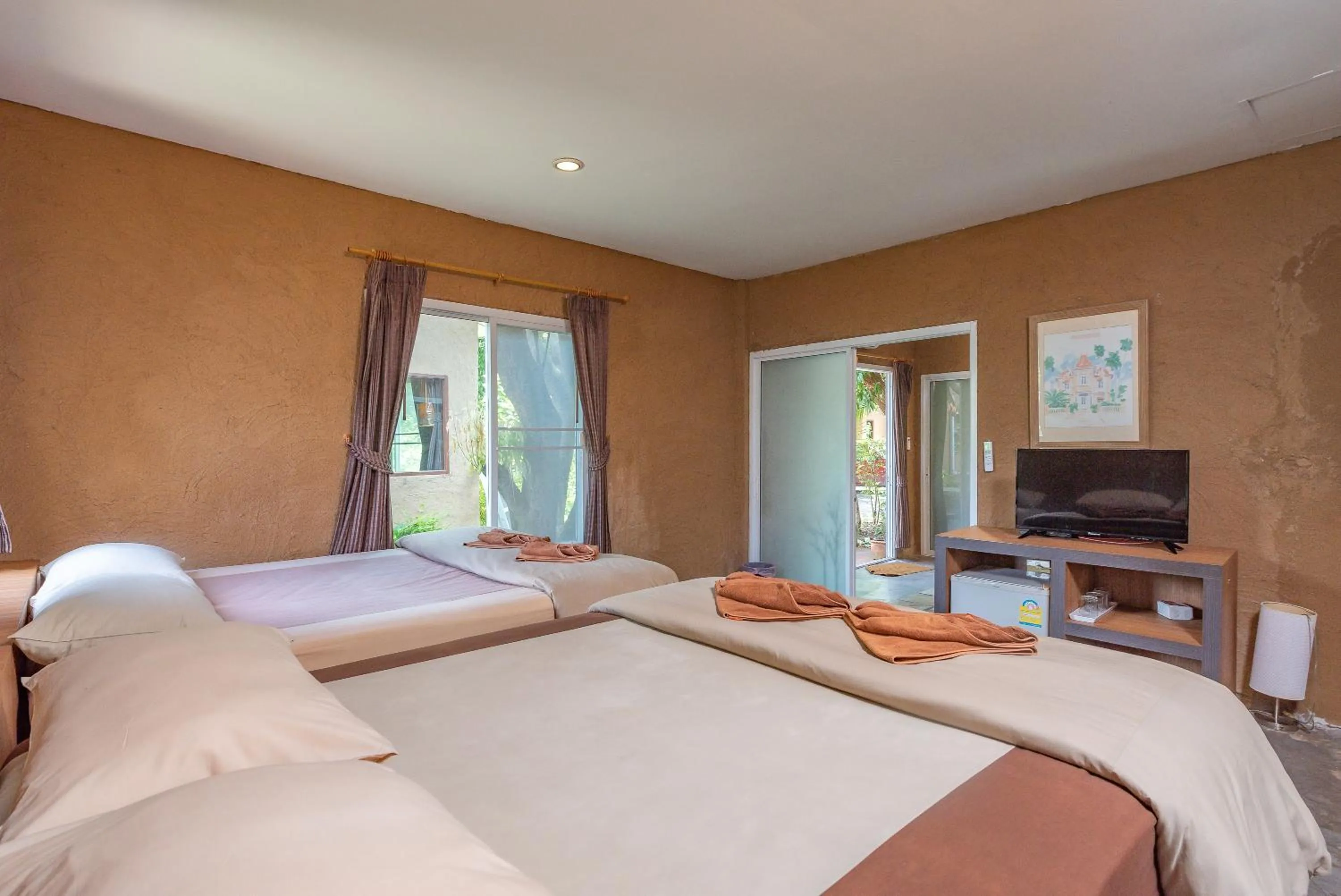 Photo of the whole room, Bed in Muntra Garden Resort