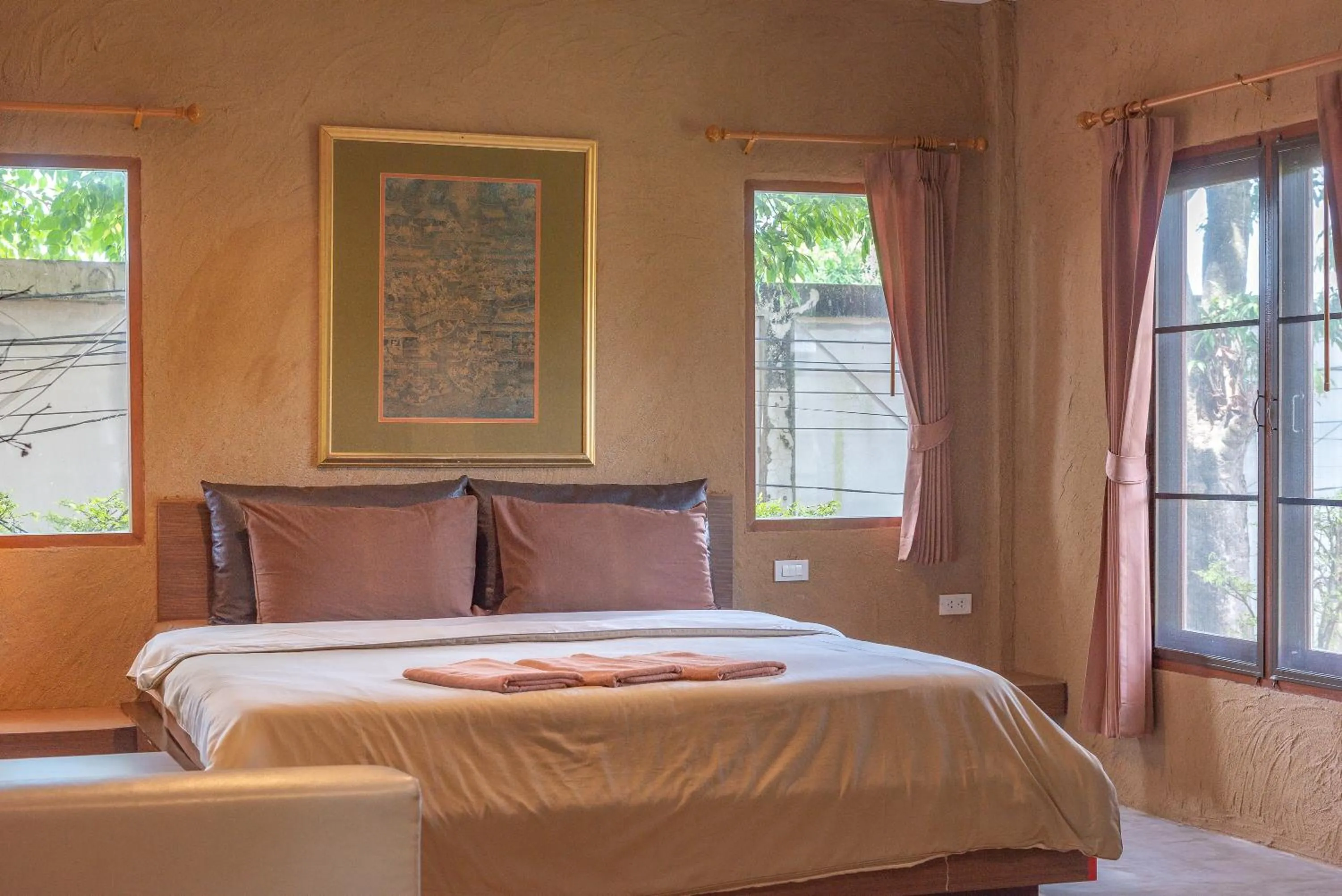 Bed in Muntra Garden Resort