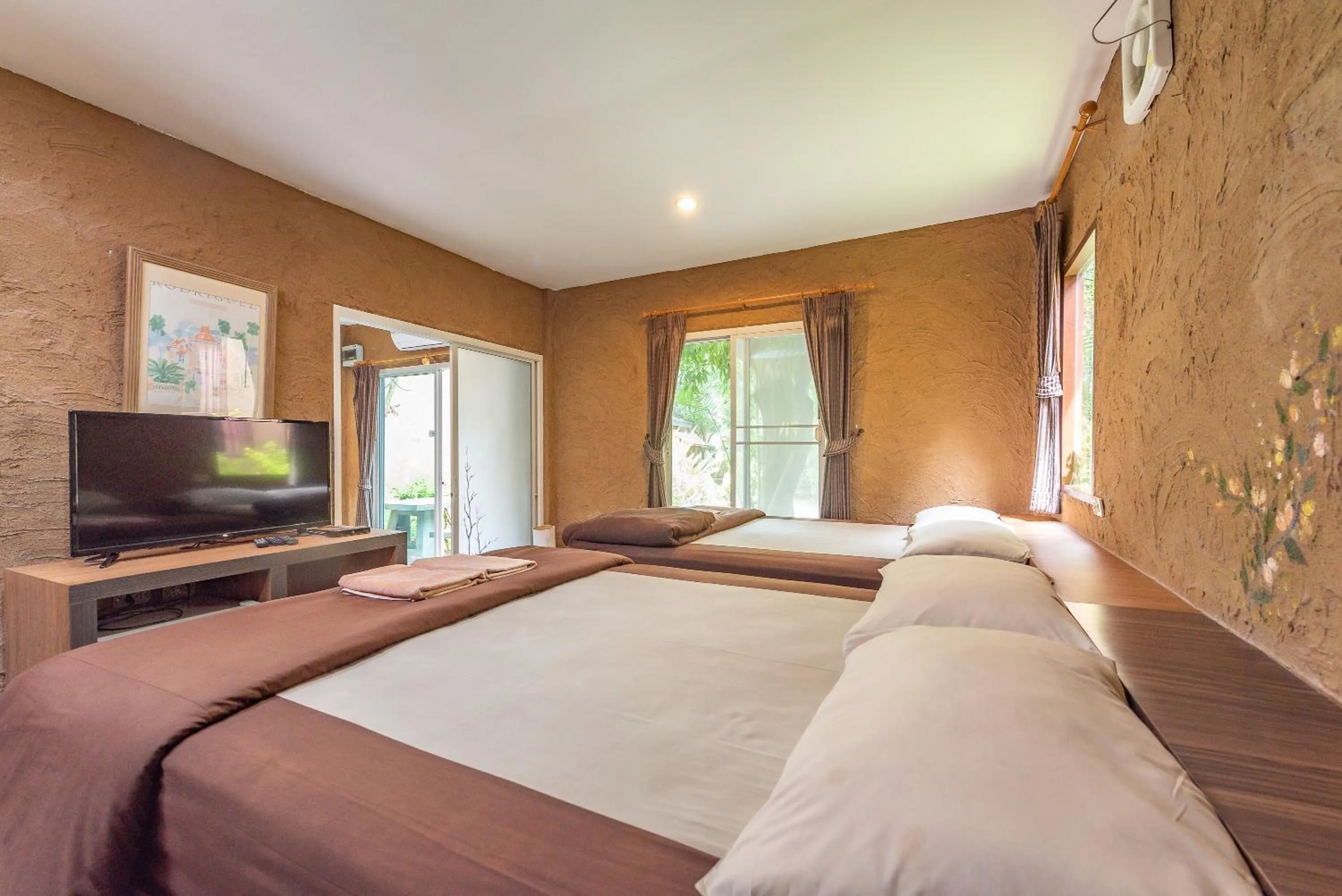 TV and multimedia, Bed in Muntra Garden Resort