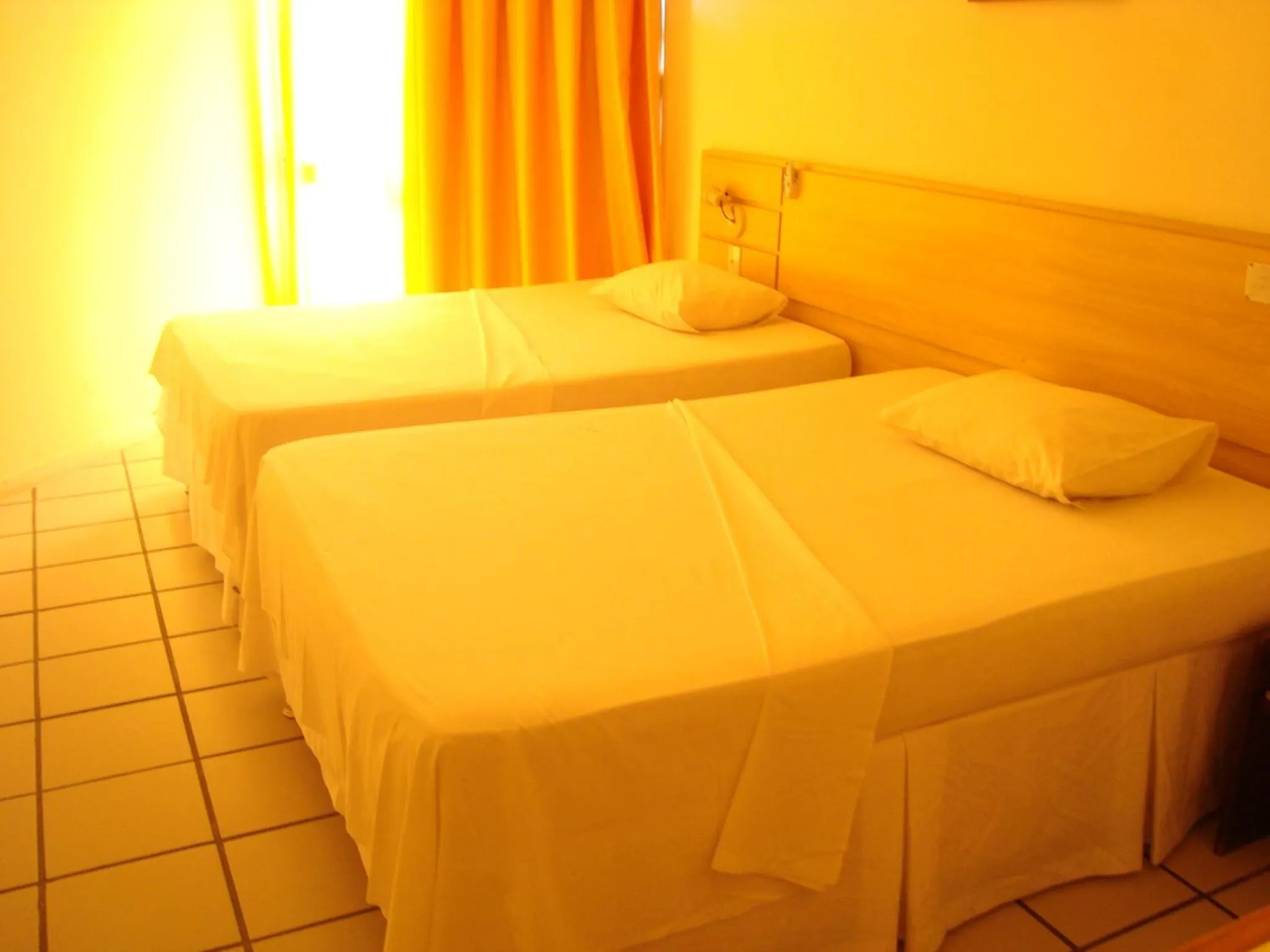 Bed in MK Express Hotel