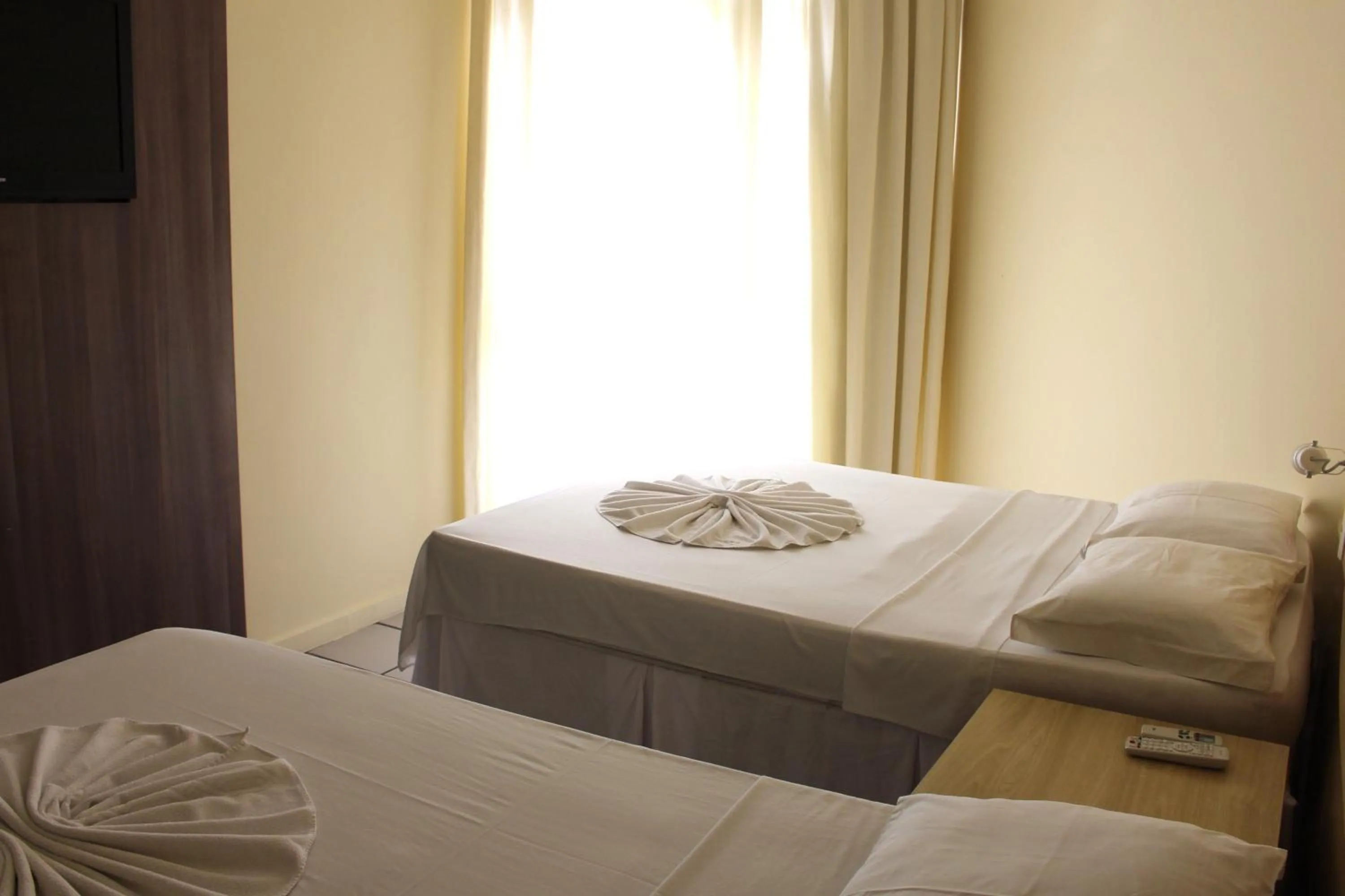 Bed in MK Express Hotel