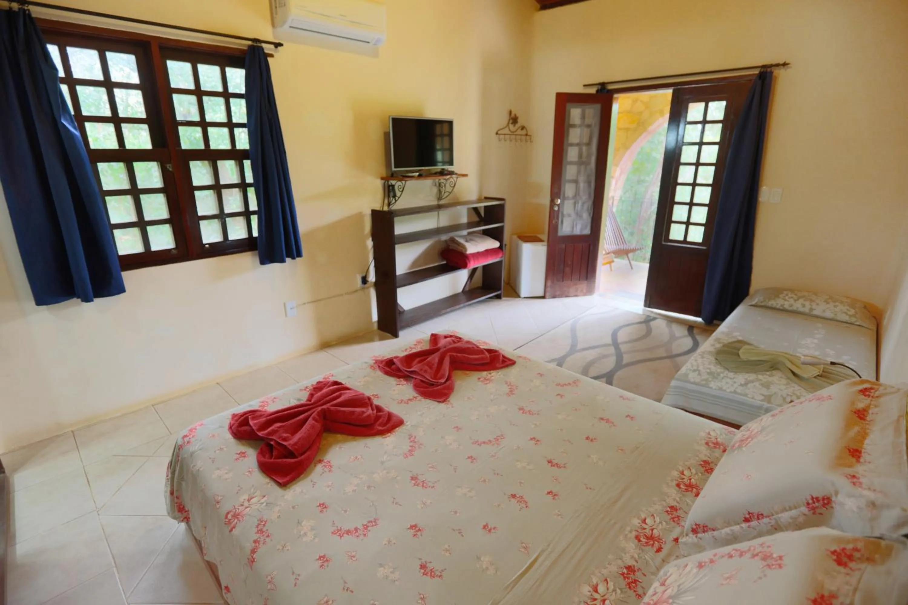 Bed in Pousada Canto No Bosque