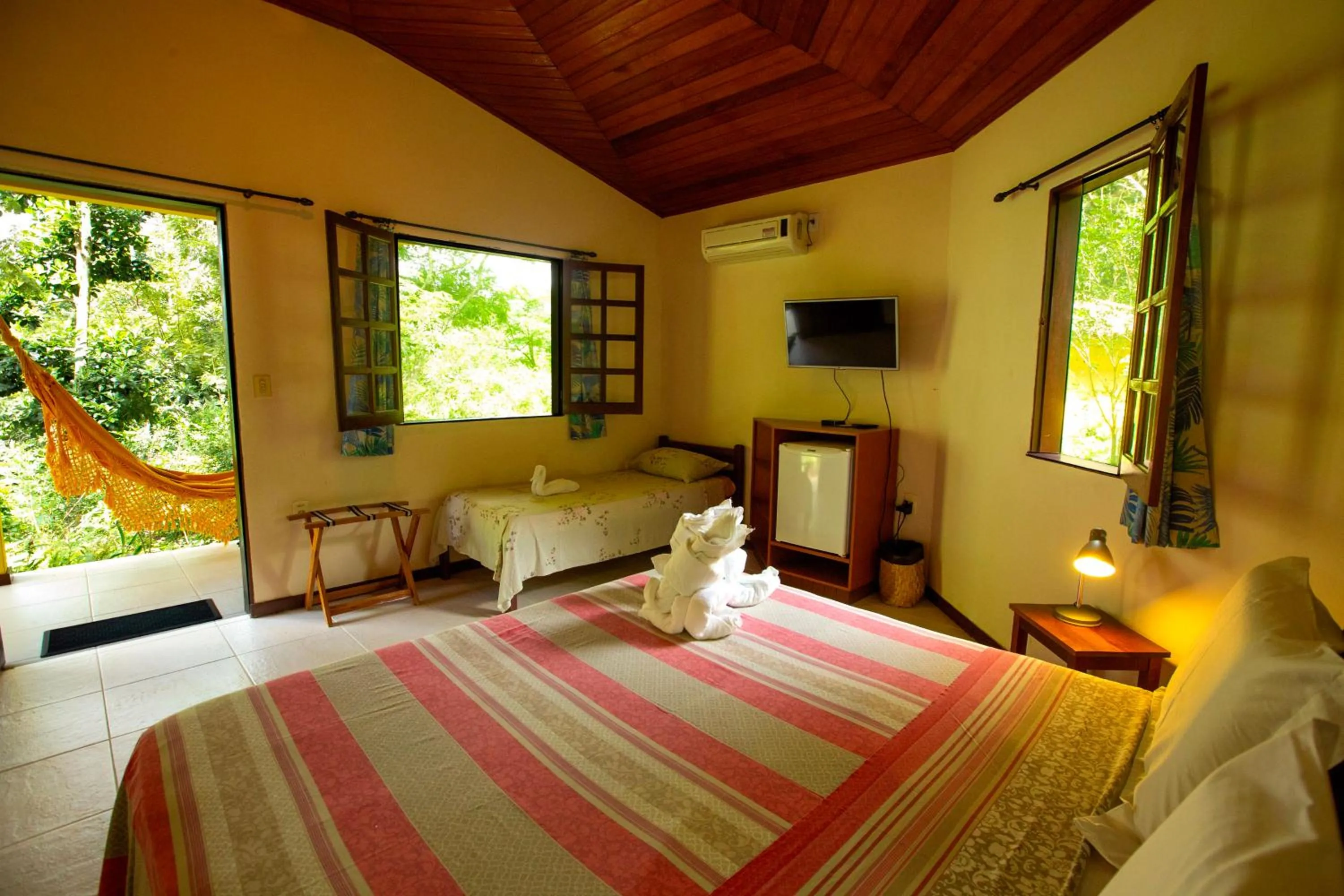 Bed in Pousada Canto No Bosque