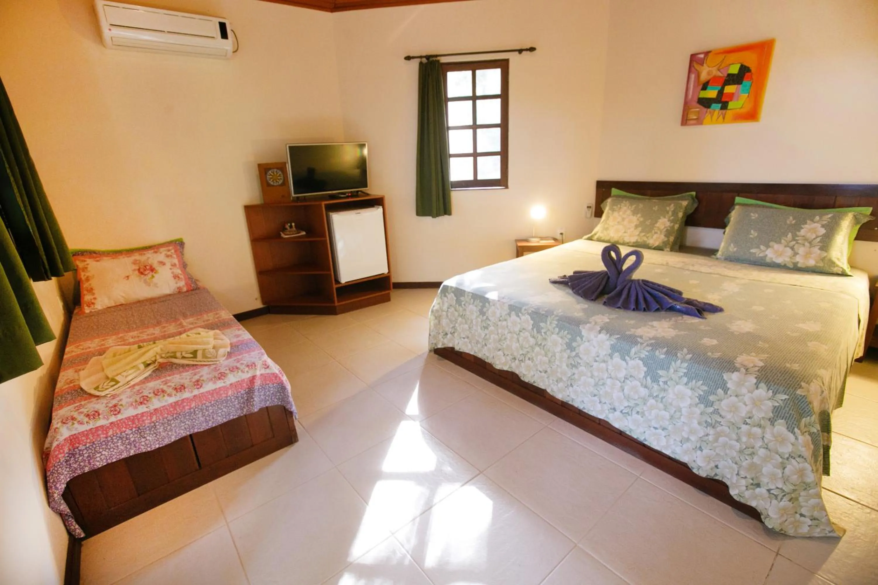 Bed in Pousada Canto No Bosque